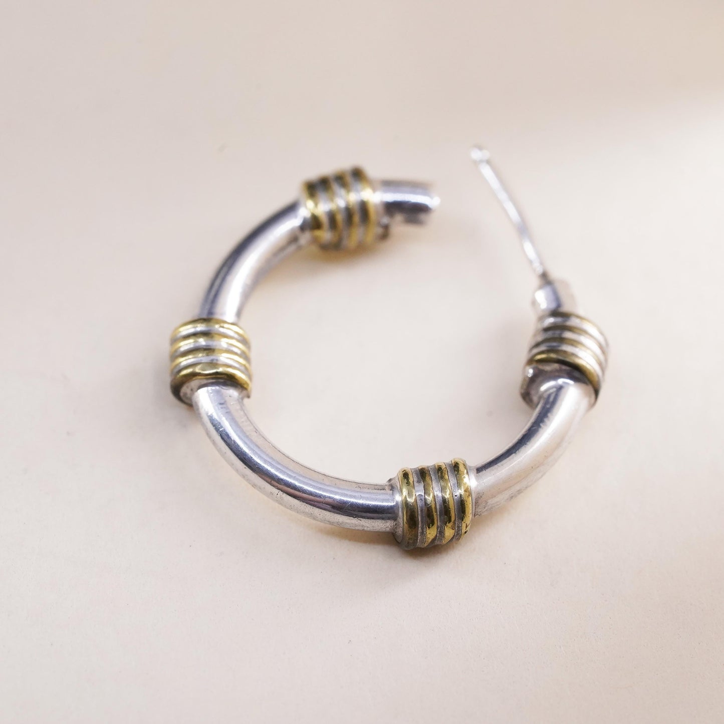 Vintage two tone Mexican single earring. Sterling 925 silver huggie stud