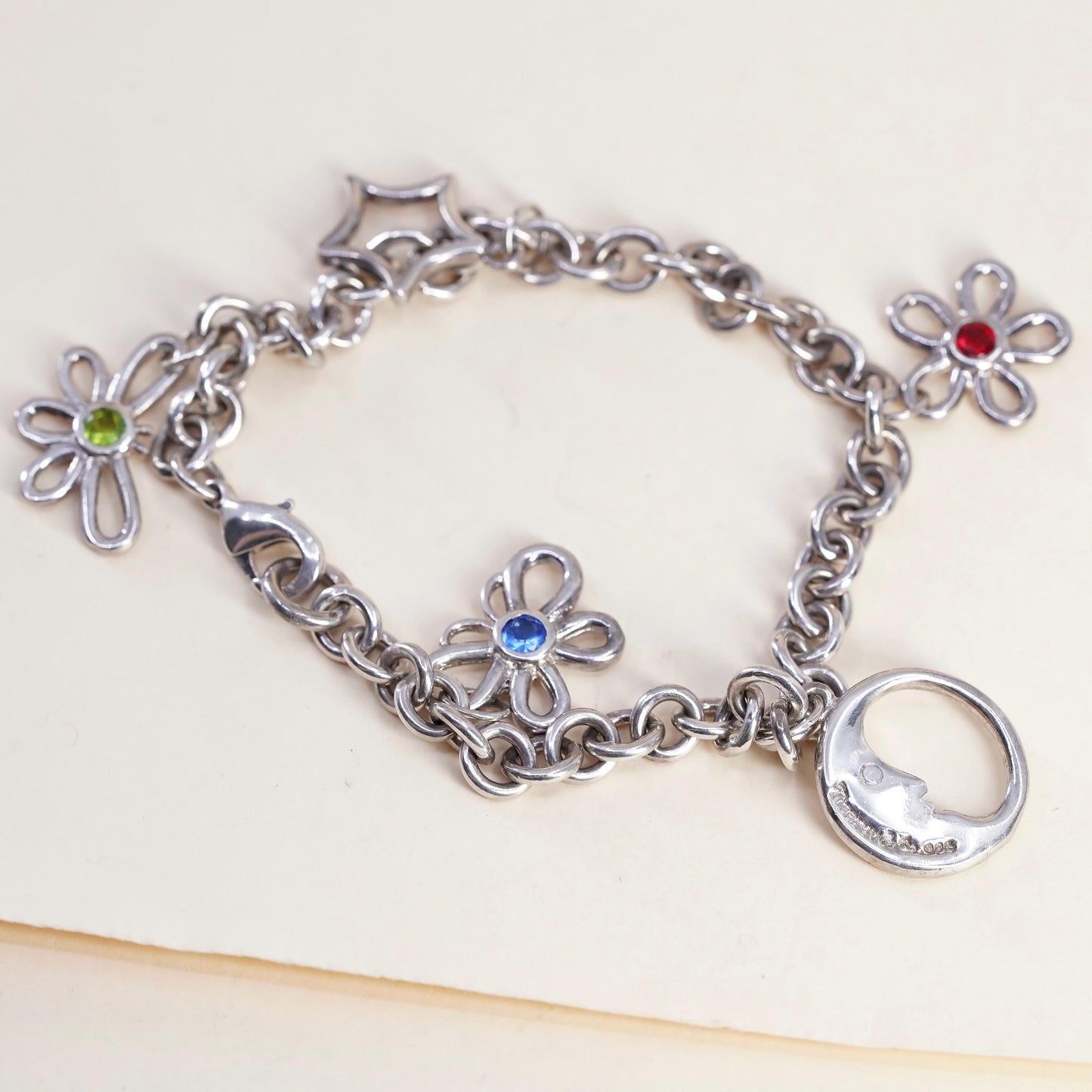 6.75”, Vintage sterling 925 silver circle bracelet with flower moon star charms