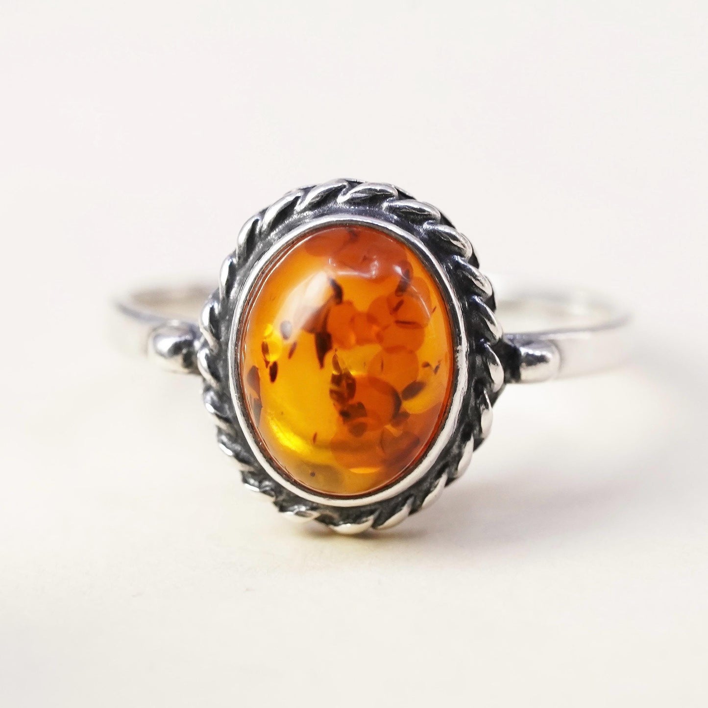 Size 5, Vintage sterling 925 silver handmade ring with Amber and cable around