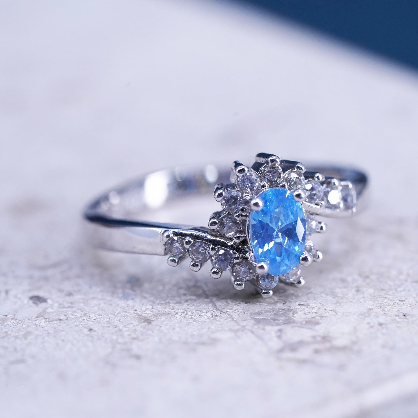 Size 7, vintage sterling 925 silver handmade ring with blue topaz and cz around