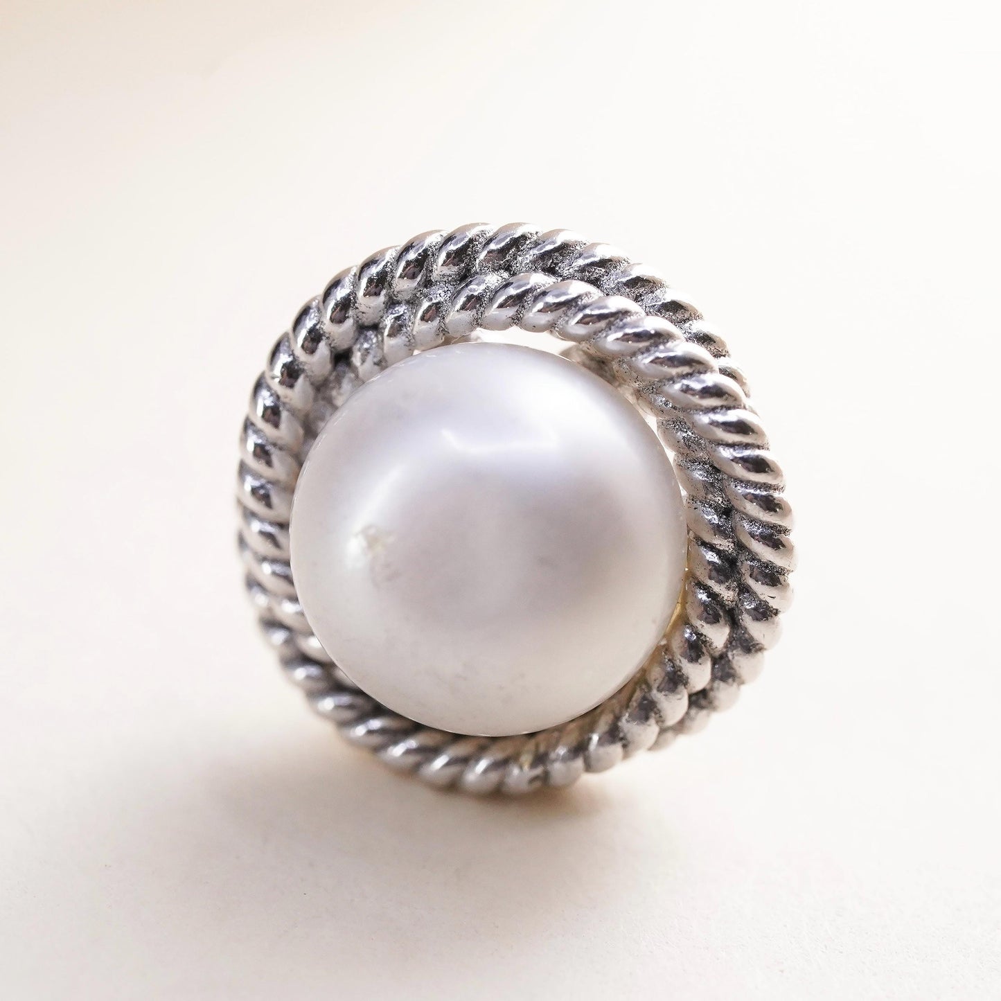 Vintage single earring. Sterling 925 silver pearl stud with cable around