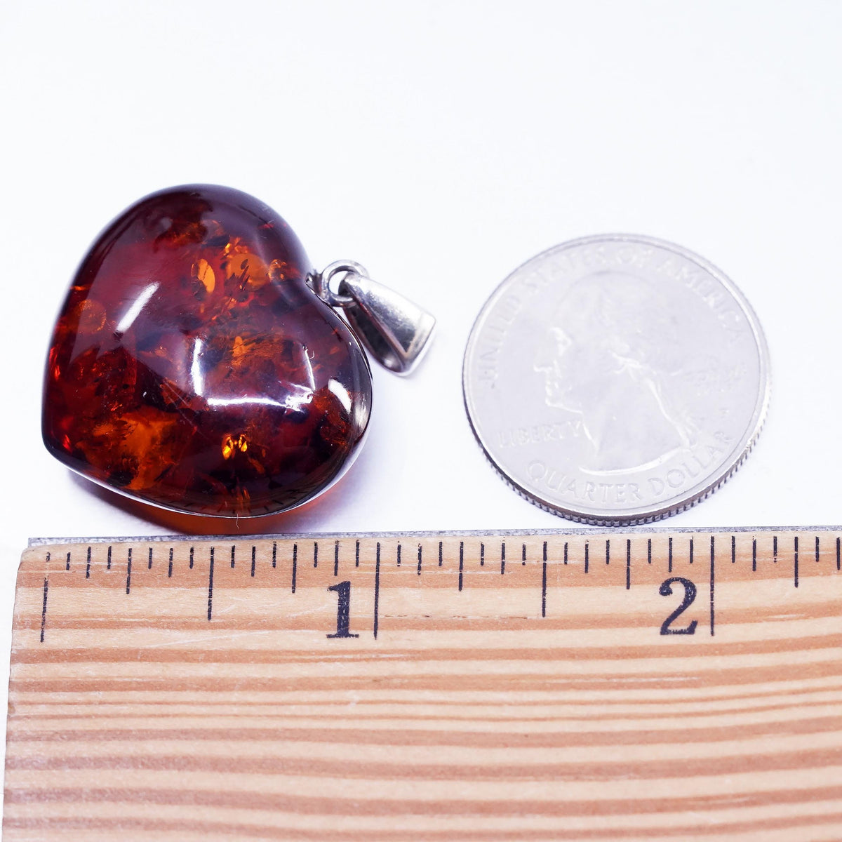 Vintage sterling 925 silver handmade pendant with heart amber