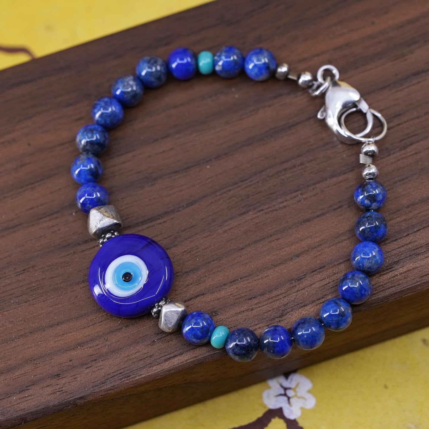6.75", vintage sterling silver bracelet with blue evil eye lapis lazuli beads