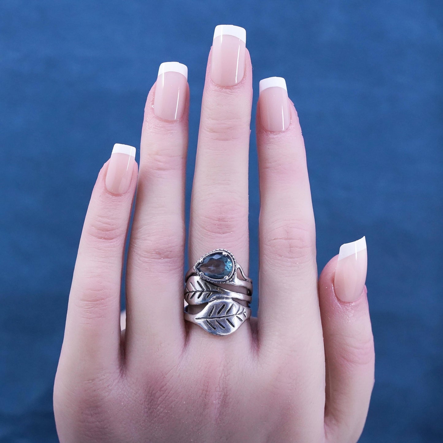 Size 8, vintage Israel Shablool Didae Sterling silver wavy ring with blue topaz