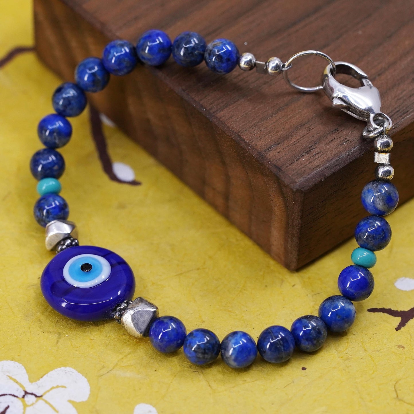 6.75", vintage sterling silver bracelet with blue evil eye lapis lazuli beads