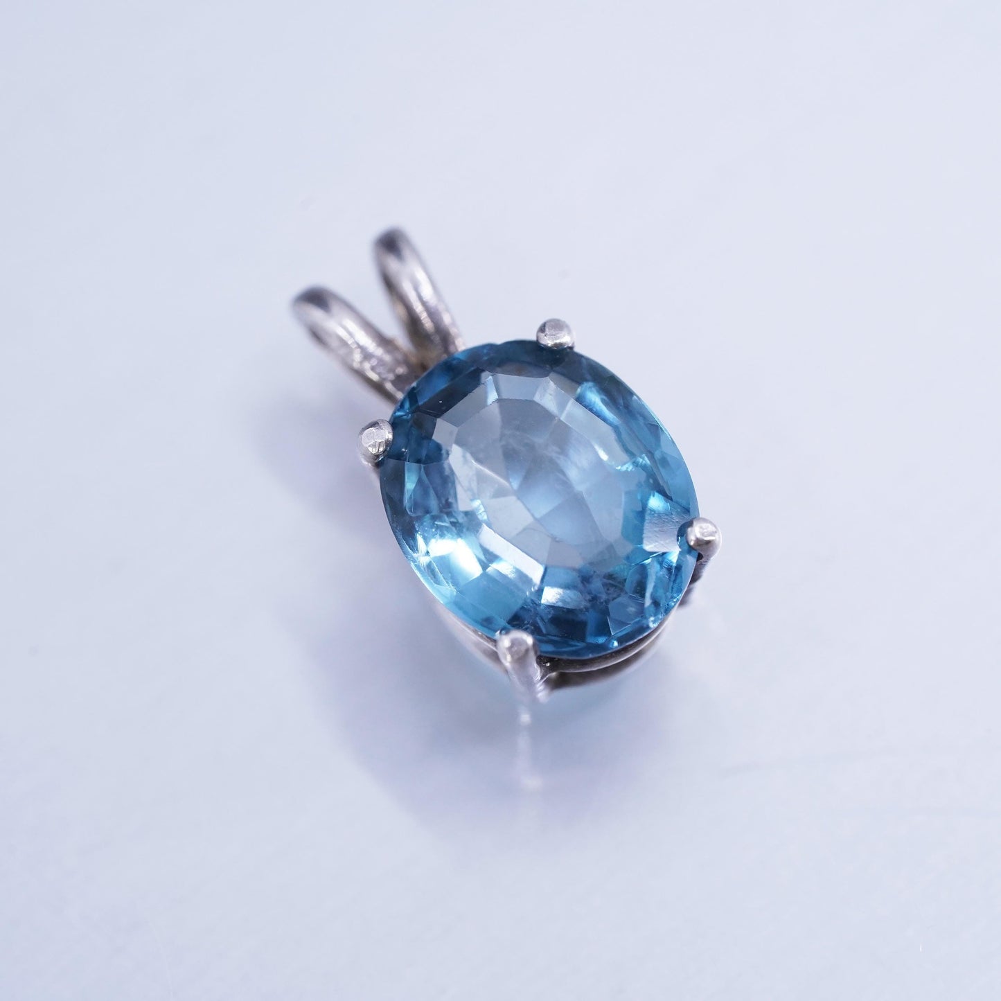 Vintage sterling 925 silver oval pendant with blue topaz