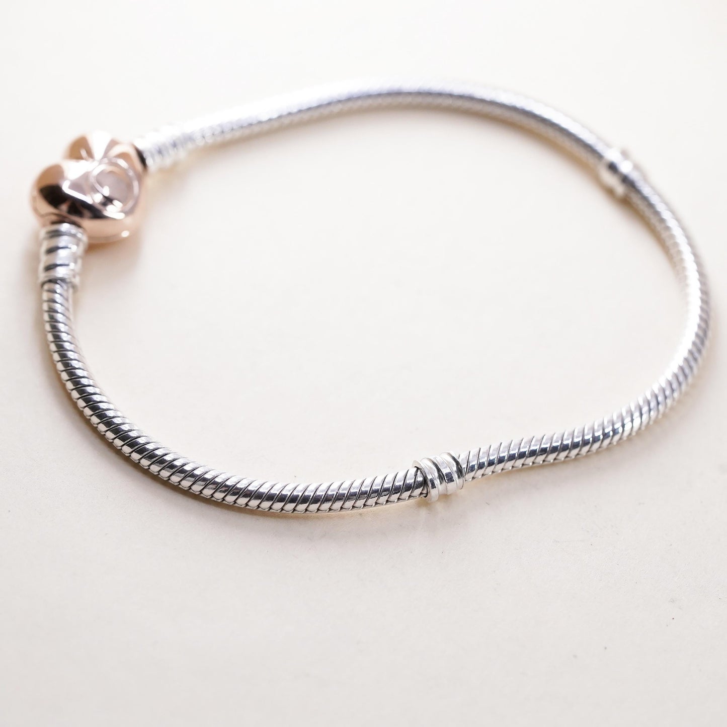 6.75” Pandora two tone sterling silver bracelet, 925 snake rose gold heart