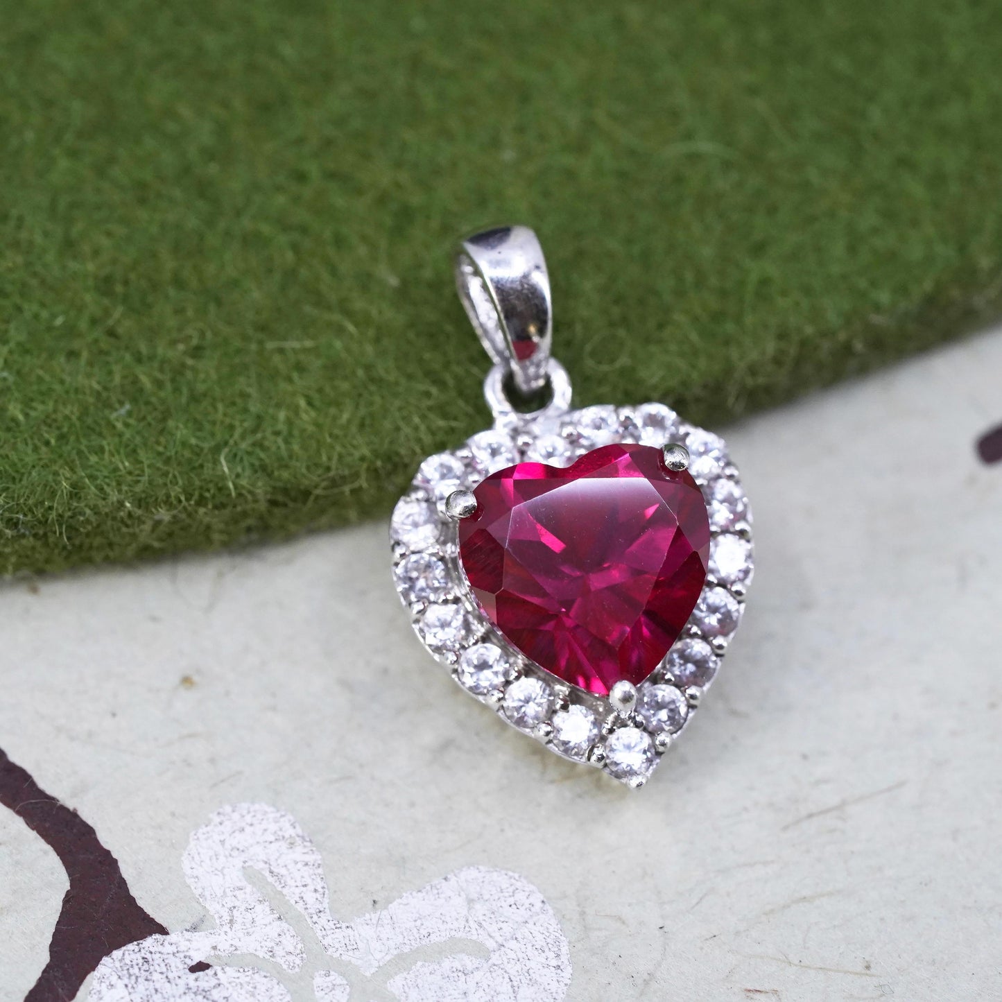 Vintage sterling silver pendant, 925 silver heart with ruby and cz around