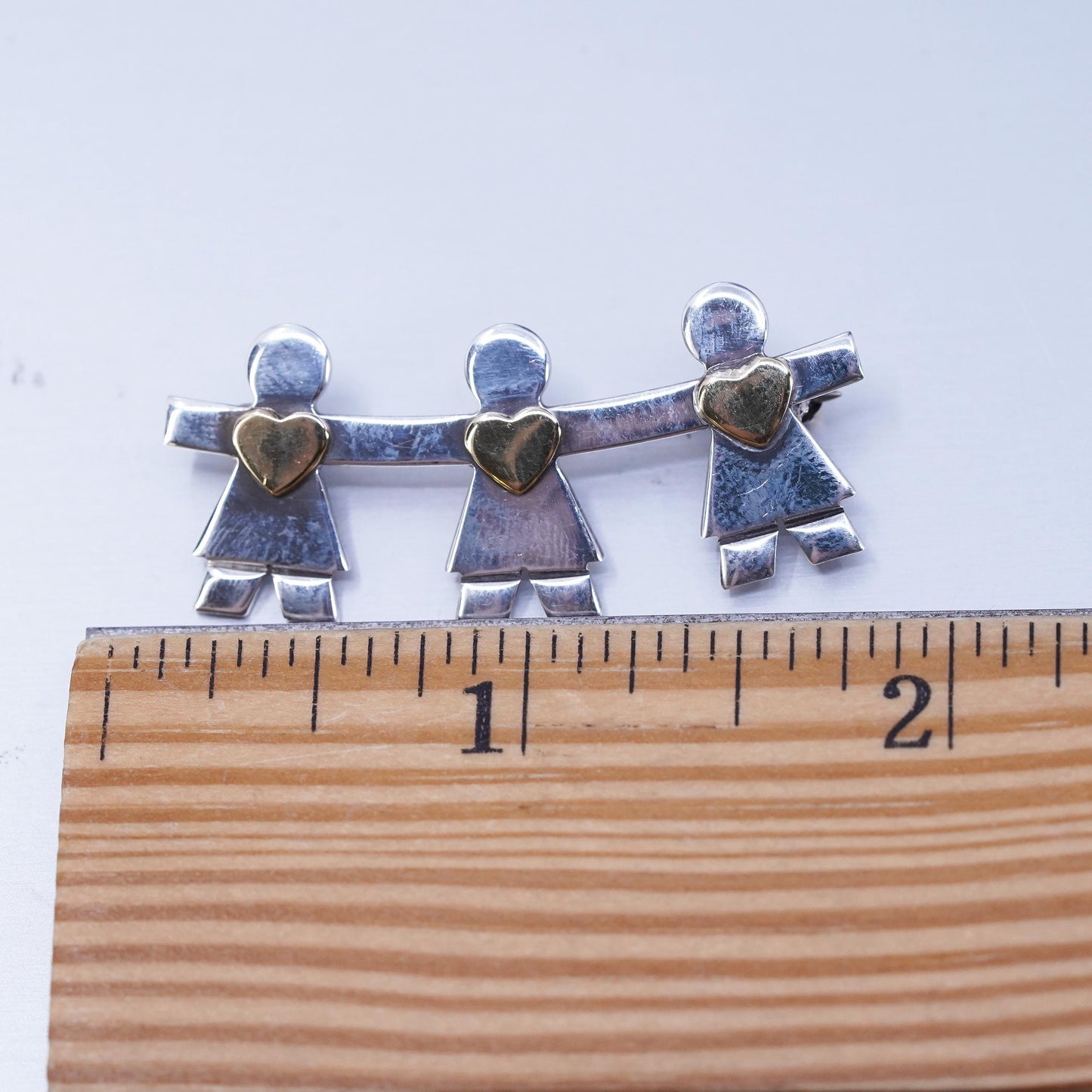 Naldo two tone sterling silver brooch, girls holding hands gold heart, 925 pin