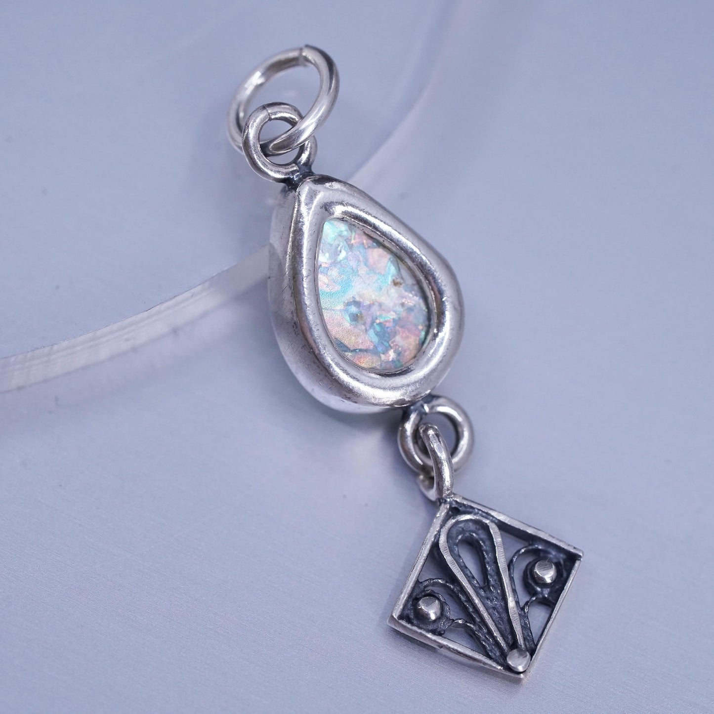 Vintage sterling 925 silver filigree teardrop pendant with dragon breath glass
