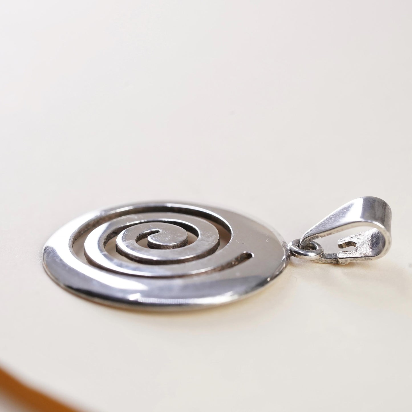 Vintage handmade Sterling silver pendant, 925 circle tag with spiral cut out