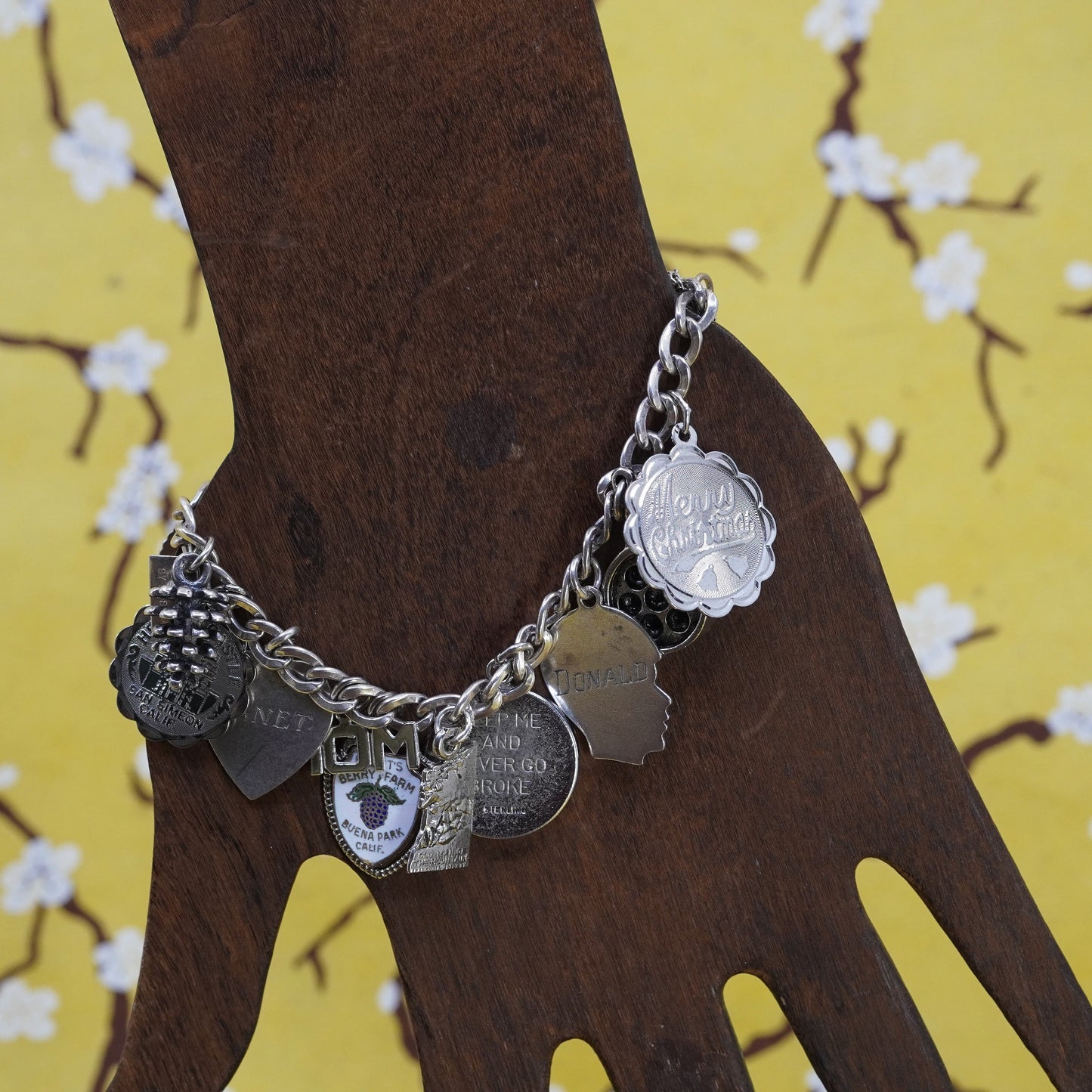 7”, vintage Sterling silver handmade bracelet, 925 curb chain with 15 charms