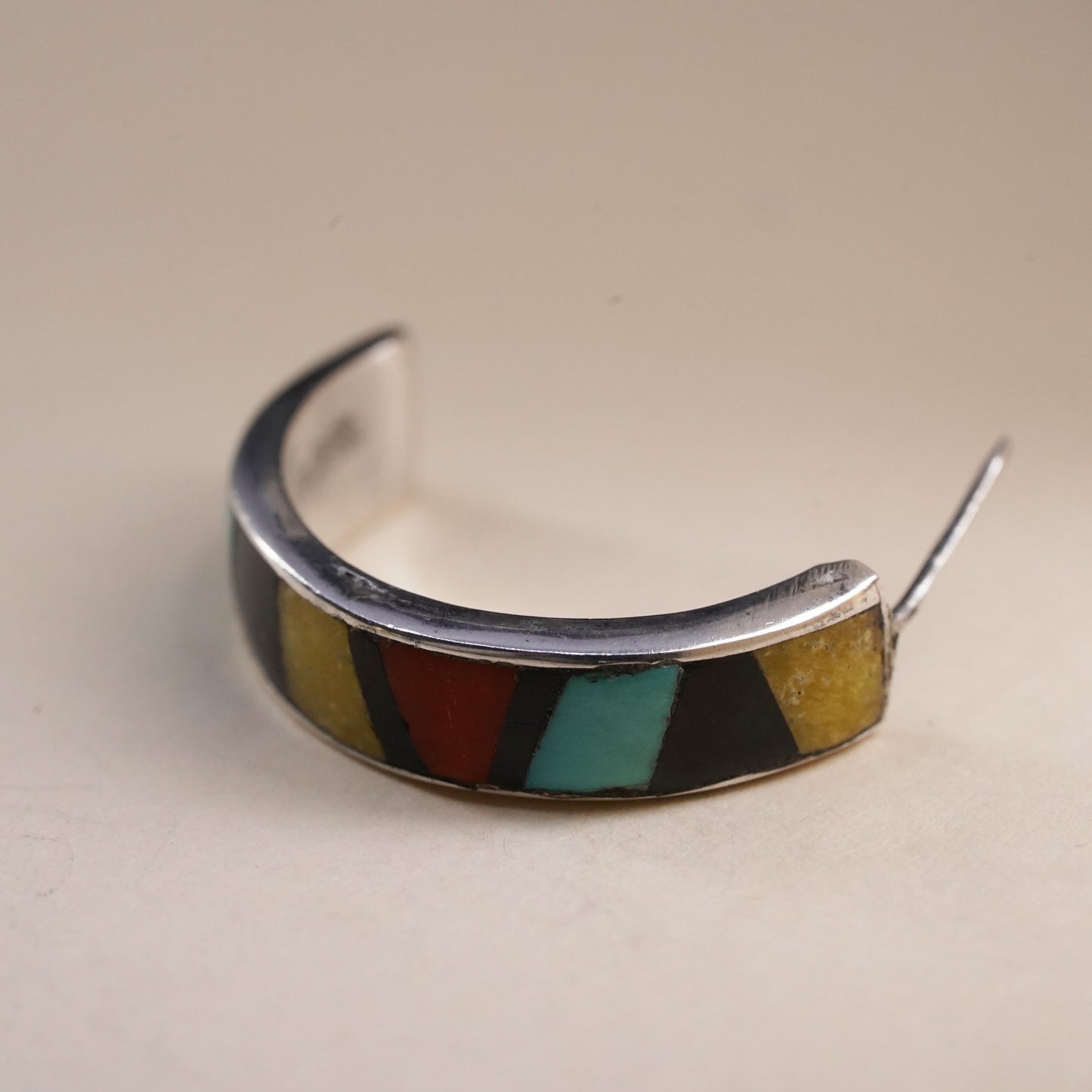 southwestern single earring. Sterling 925 silver huggie stud with turquoise