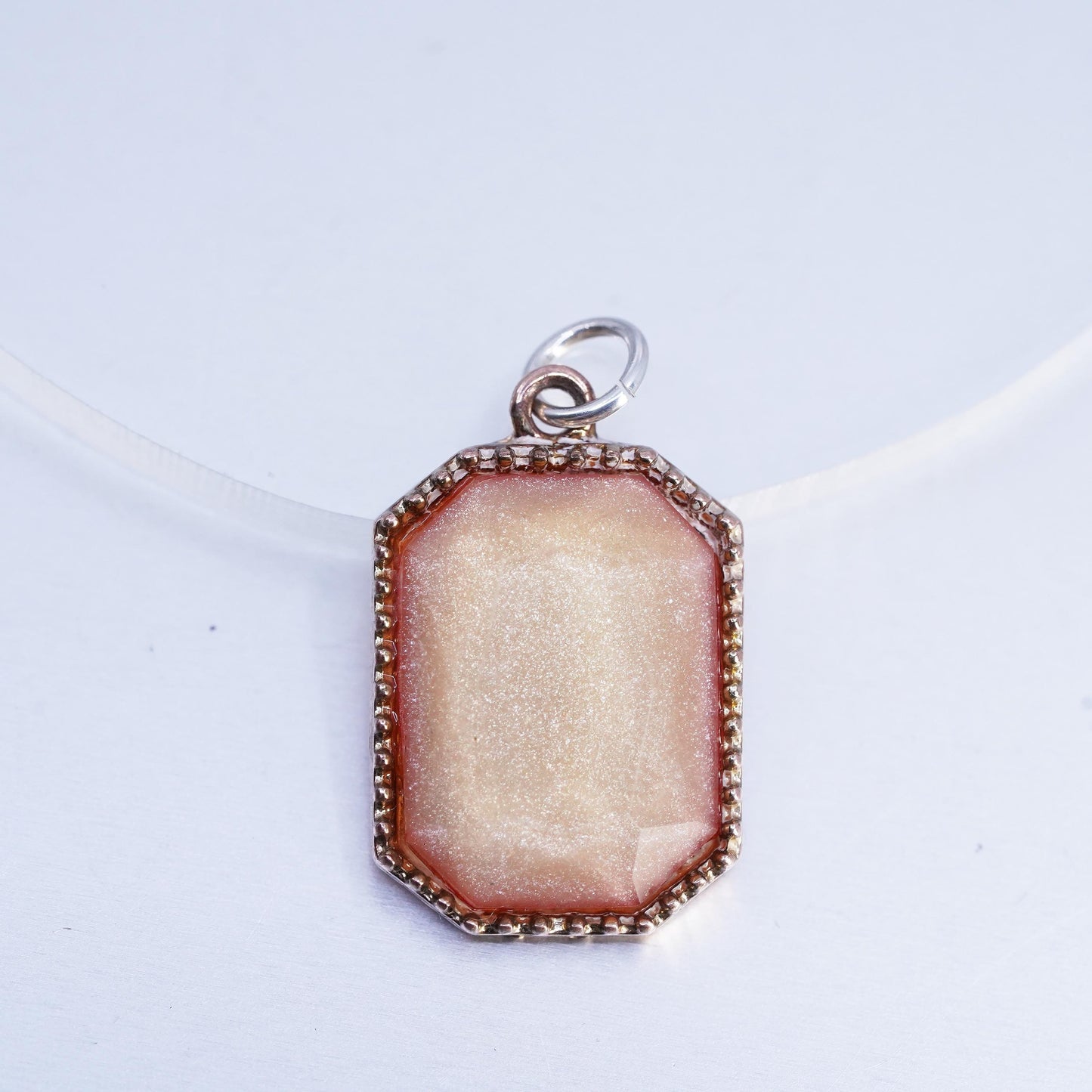 Vintage gold tone charm pendant with orange goldstone