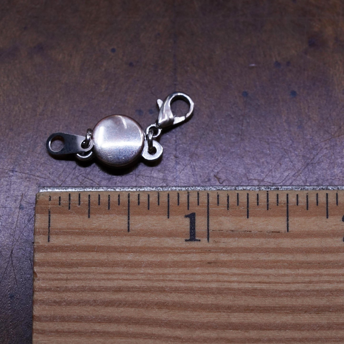 silver tone magnetic clasp