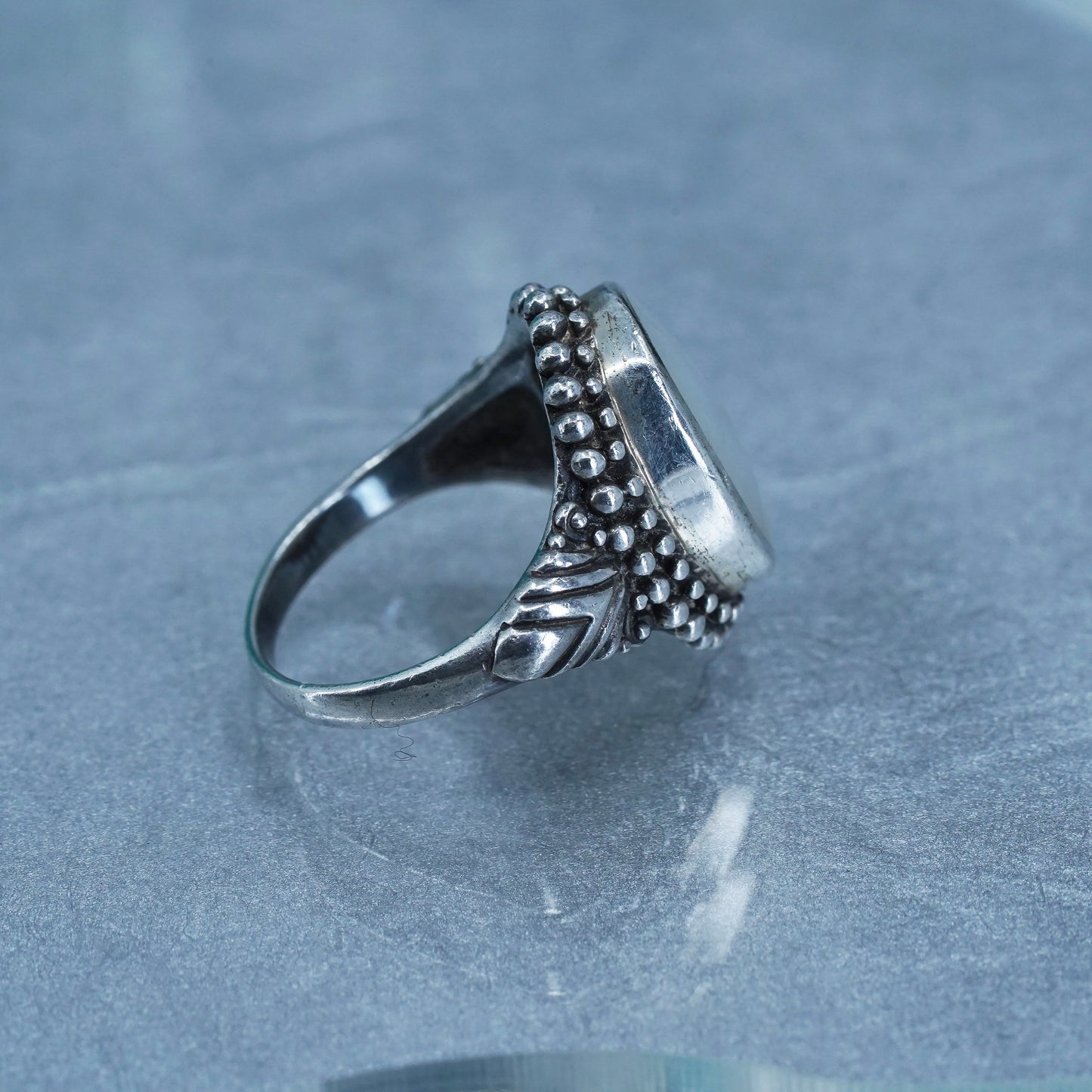 Size 7.5, southwestern Sterling 925 silver ring with mother of pearl and beads