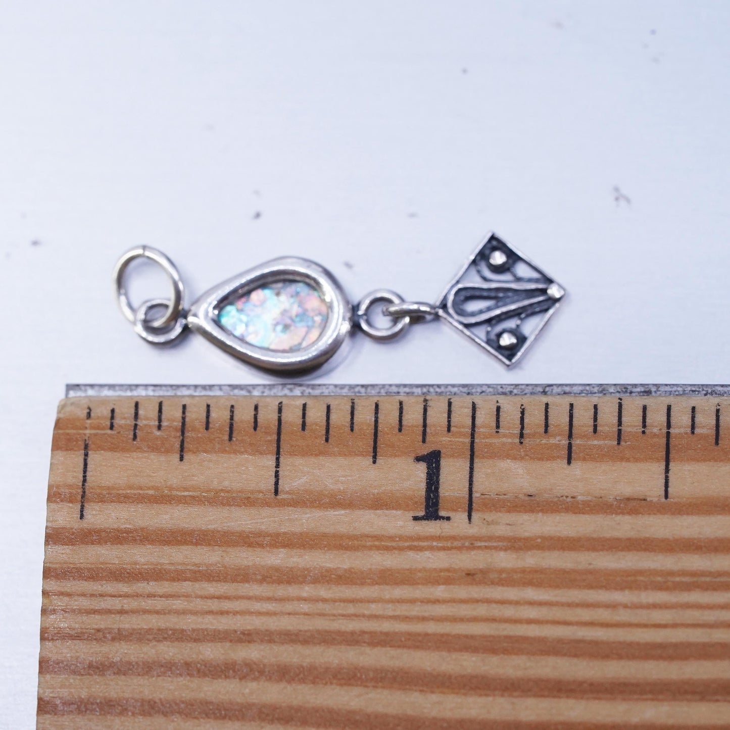 Vintage sterling 925 silver filigree teardrop pendant with dragon breath glass