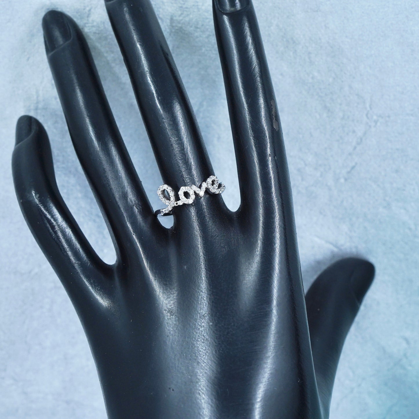 Size 8, southwestern Sterling 925 silver wedding ring, band with “love” and cz