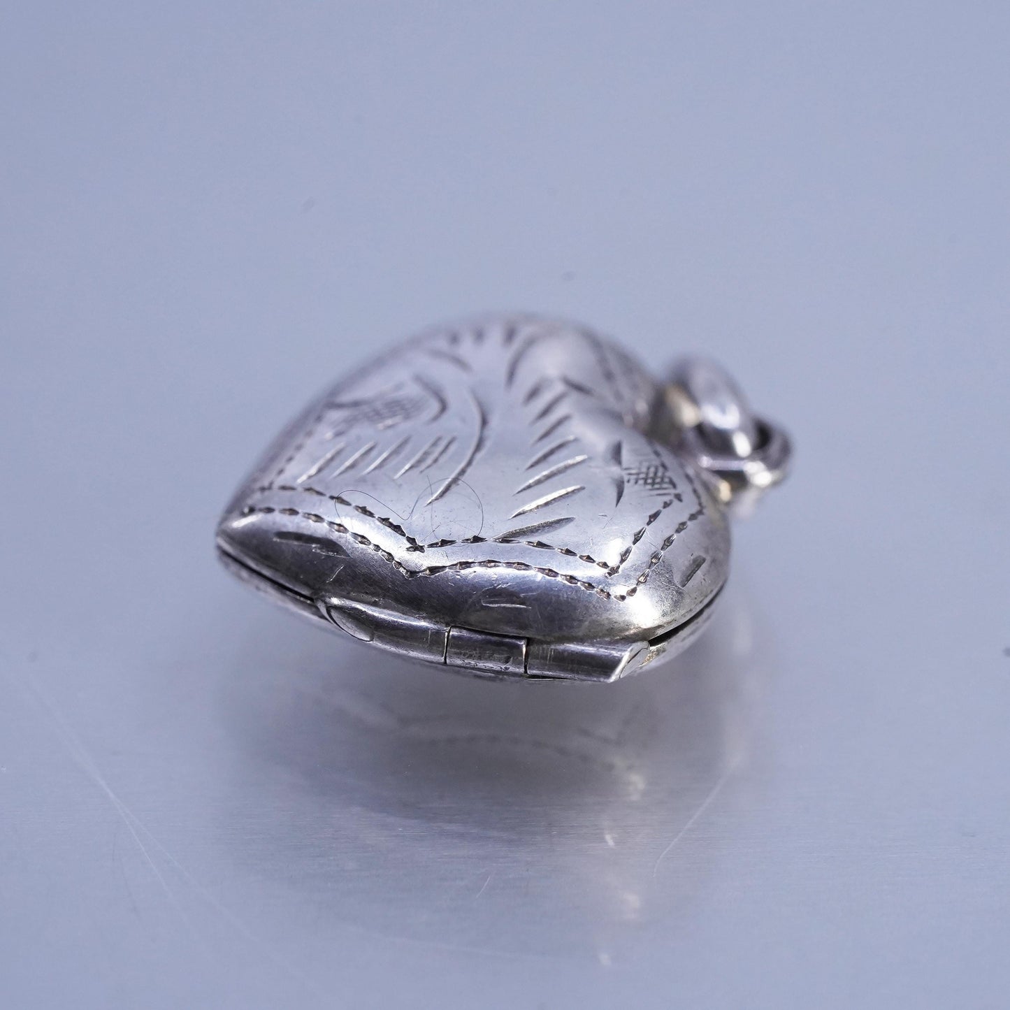 Vintage Sterling silver handmade charm, textured 925 heart photos locket