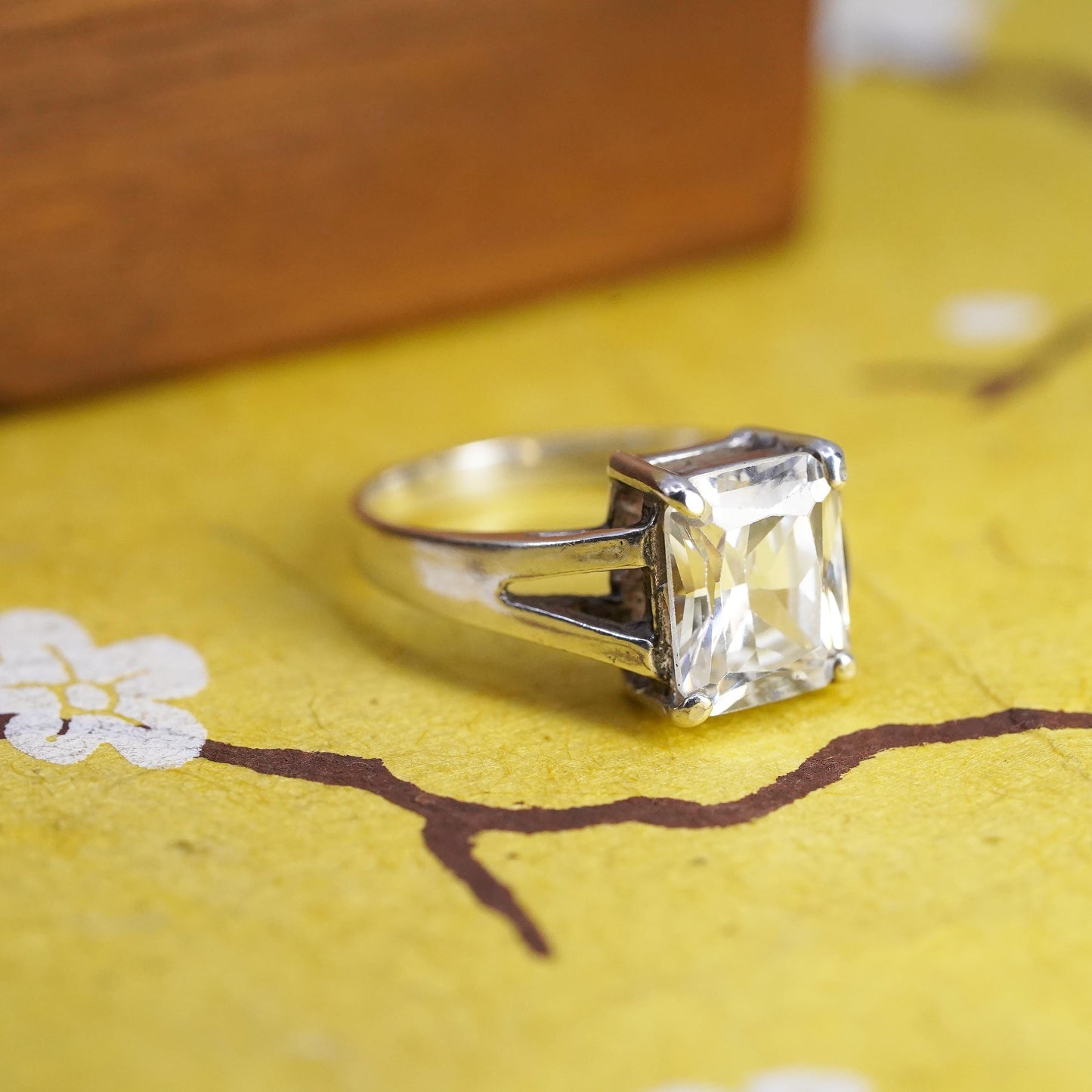 Size 7, vintage Sterling 925 silver anniversary ring with clear emerald cut cz