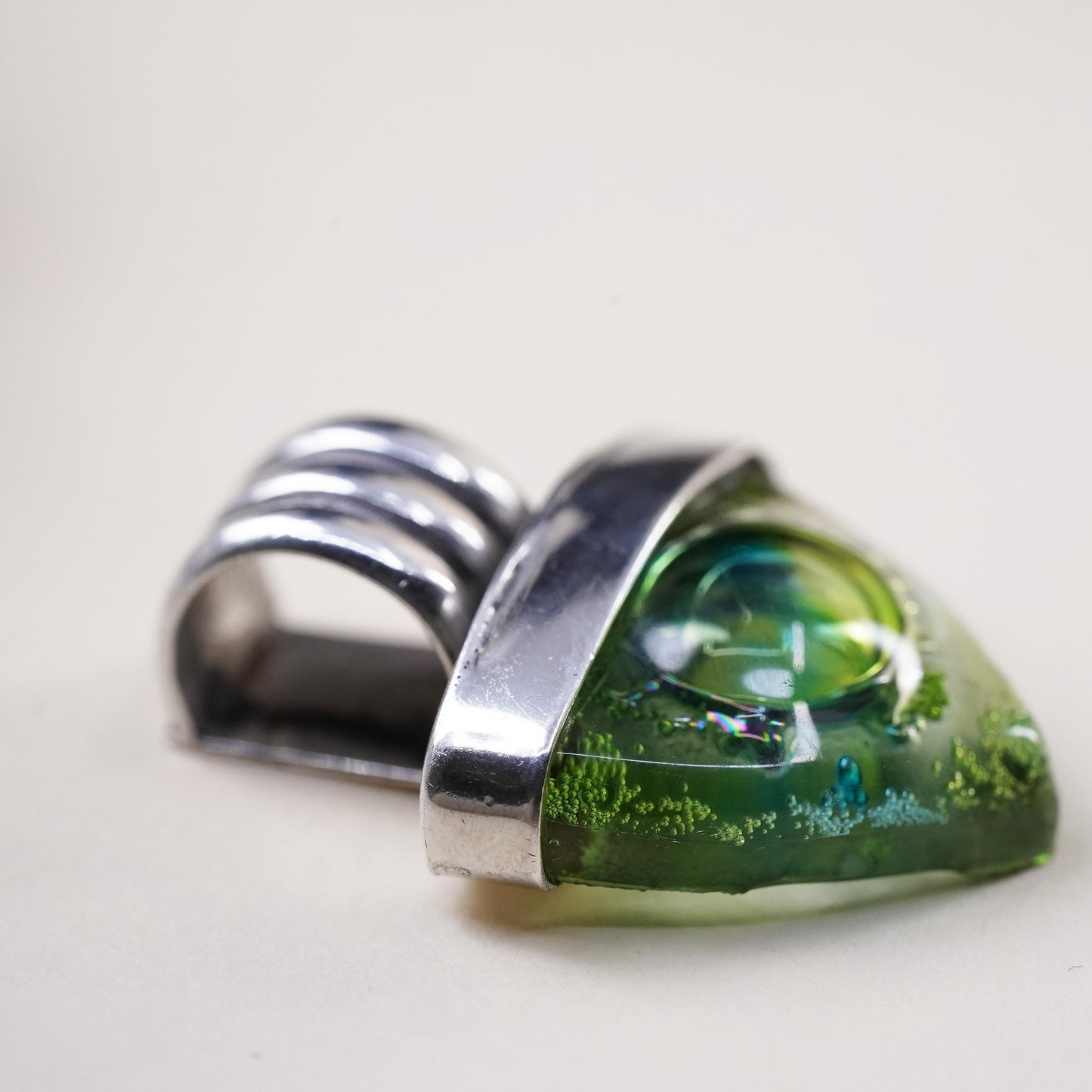 Vintage sterling silver with triangular green dichroic foiled glass pendant