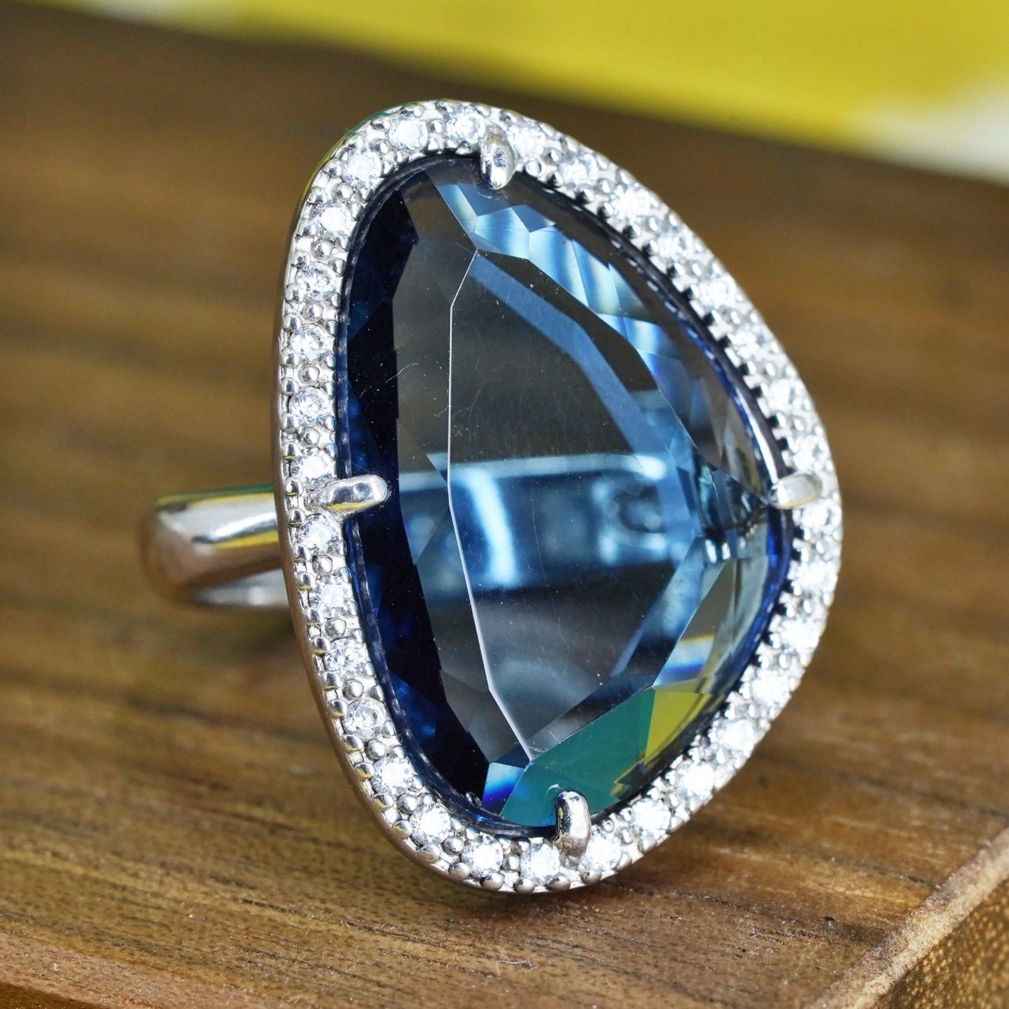 Size 7.25, vintage Sterling 925 silver ring with blue crystal and cz around