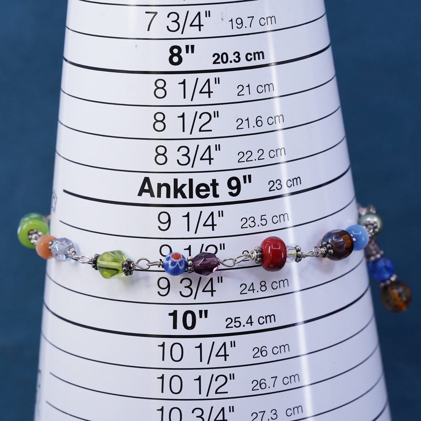 9.5", handmade brass bracelet, brass toggle closure with colorful glass beads