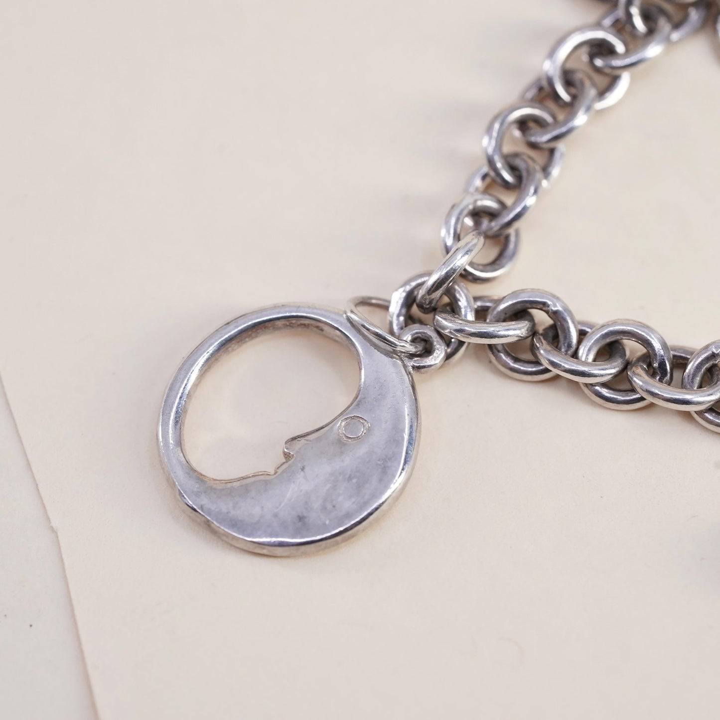 6.75”, Vintage sterling 925 silver circle bracelet with flower moon star charms