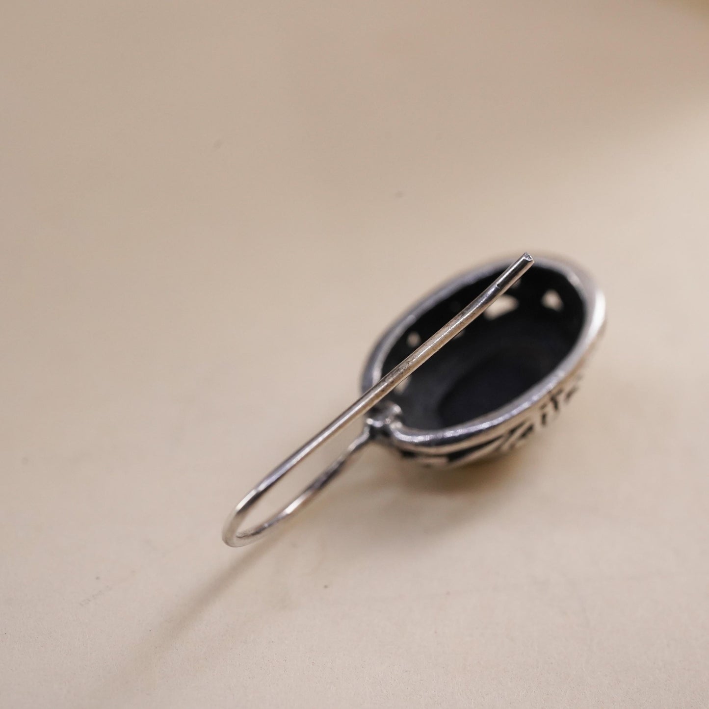 Vintage handmade single earring. Sterling 925 silver oval with onyx inlay