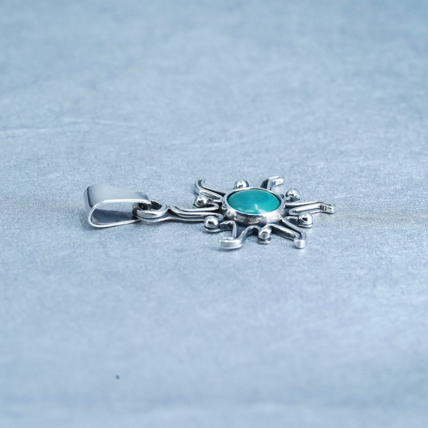 vintage Native American sterling 925 silver sun pendant with turquoise