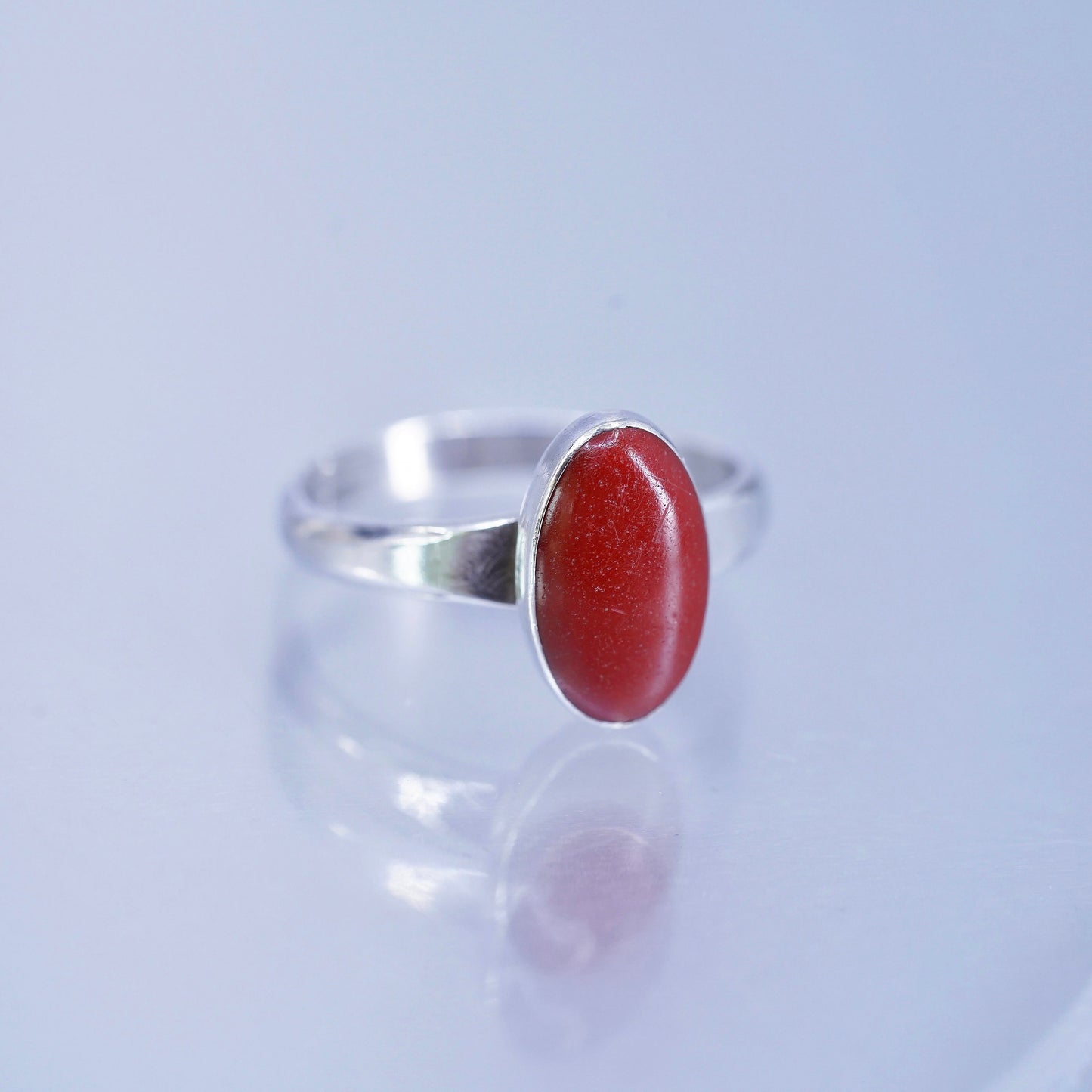 Size 6.25, southwestern Sterling 925 silver handmade band ring with oval coral