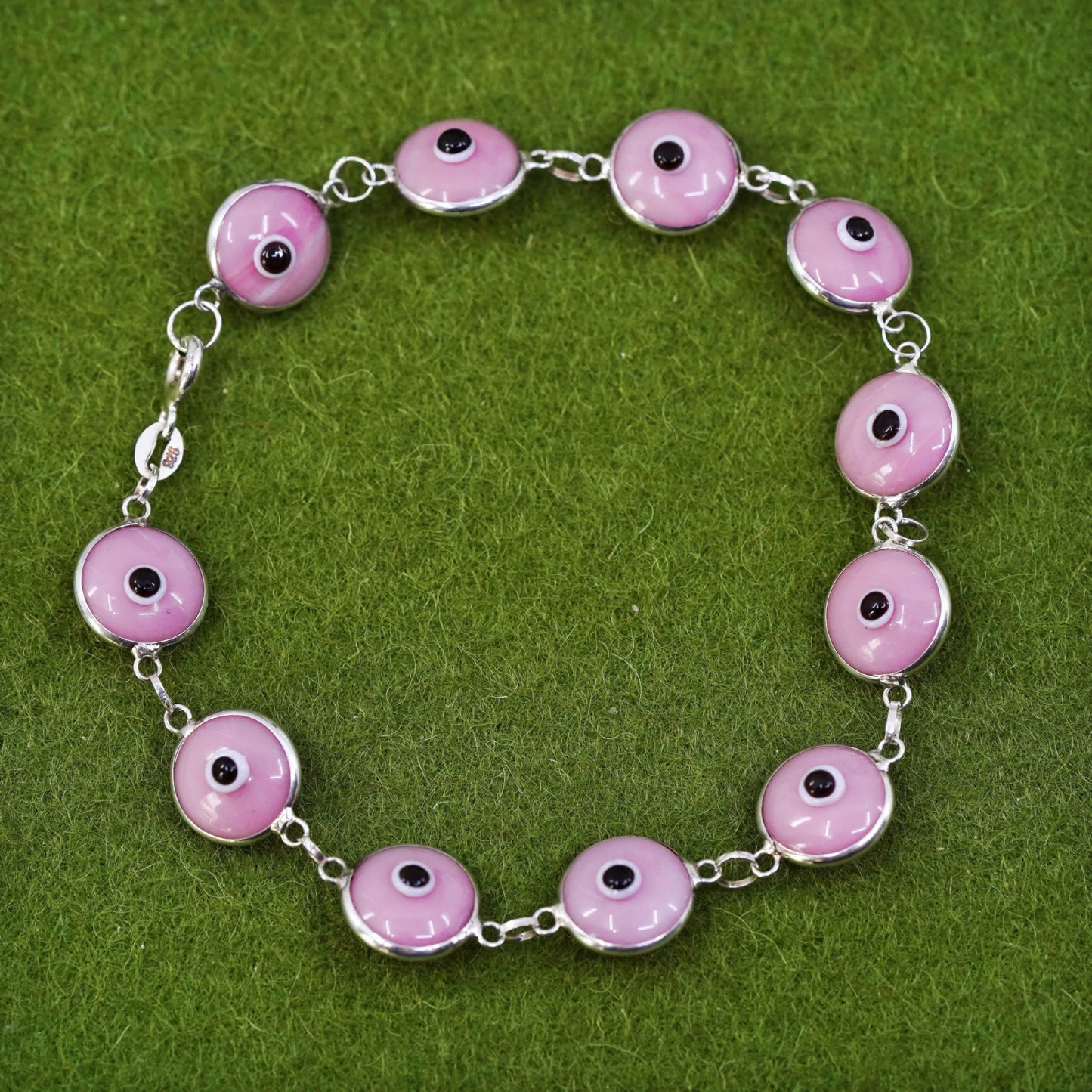 6.75”, vintage handmade sterling silver bracelet, pink glass evil eye beads