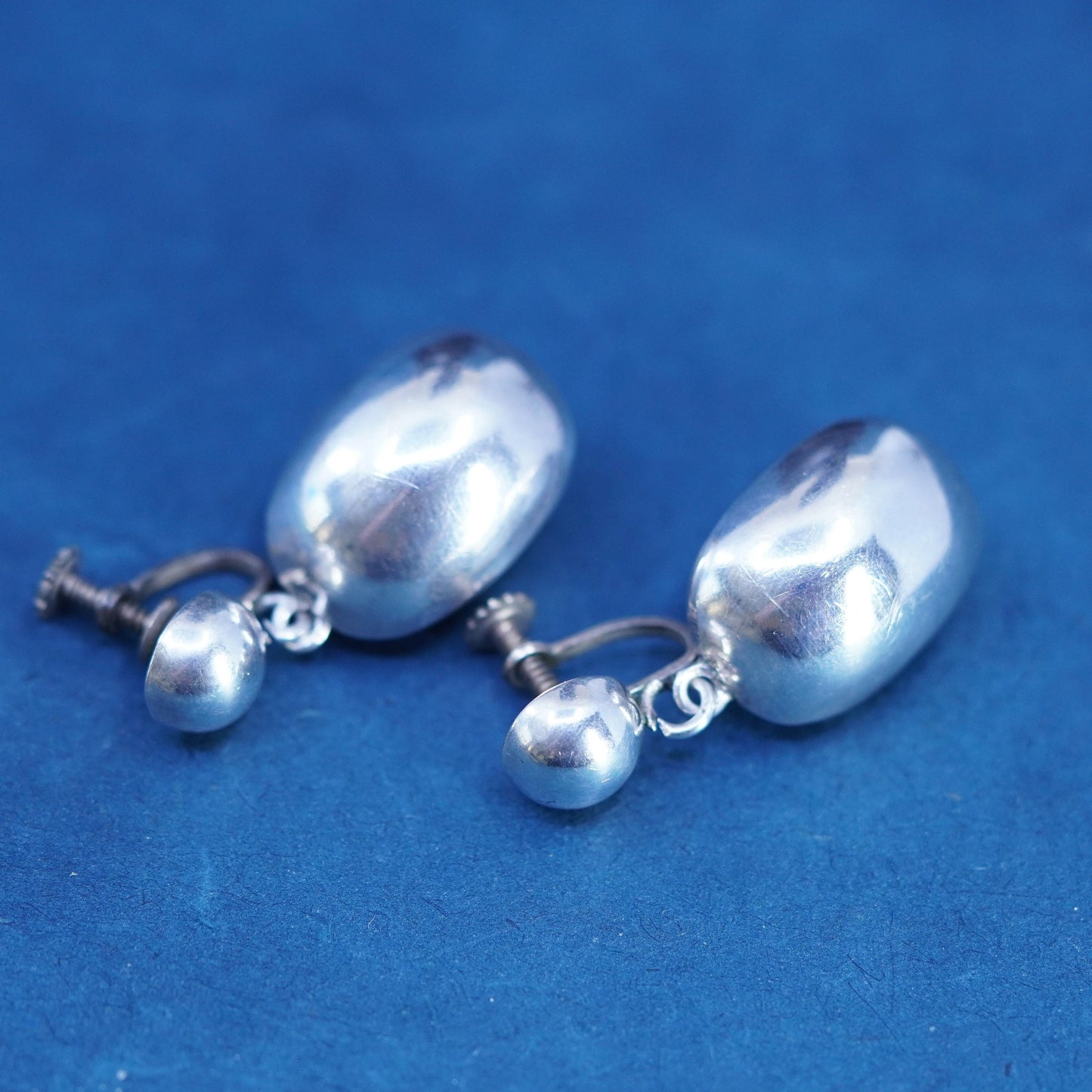 Hecho En Sterling silver handmade earrings, 925 screw back with puffy dangles
