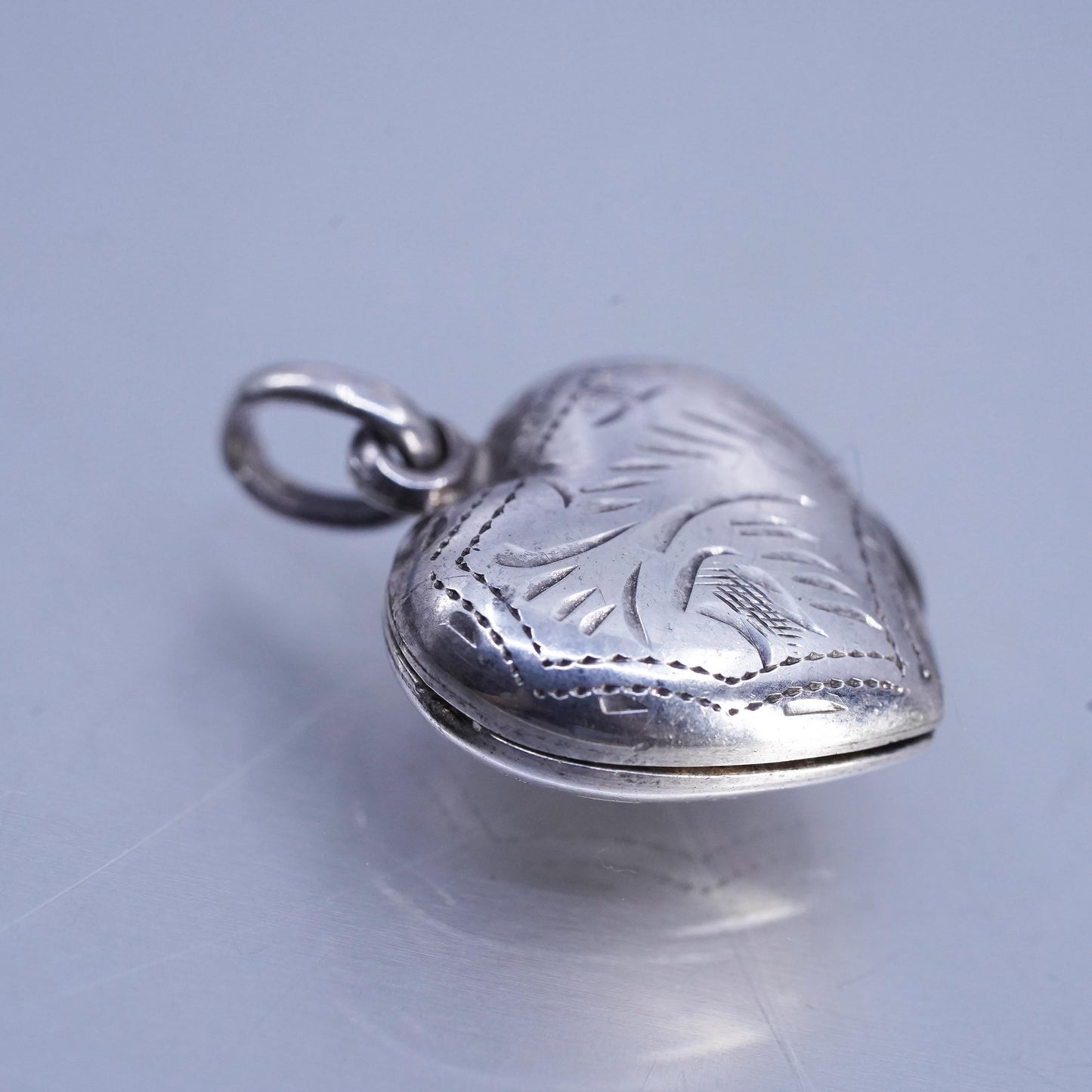Vintage Sterling silver handmade charm, textured 925 heart photos locket