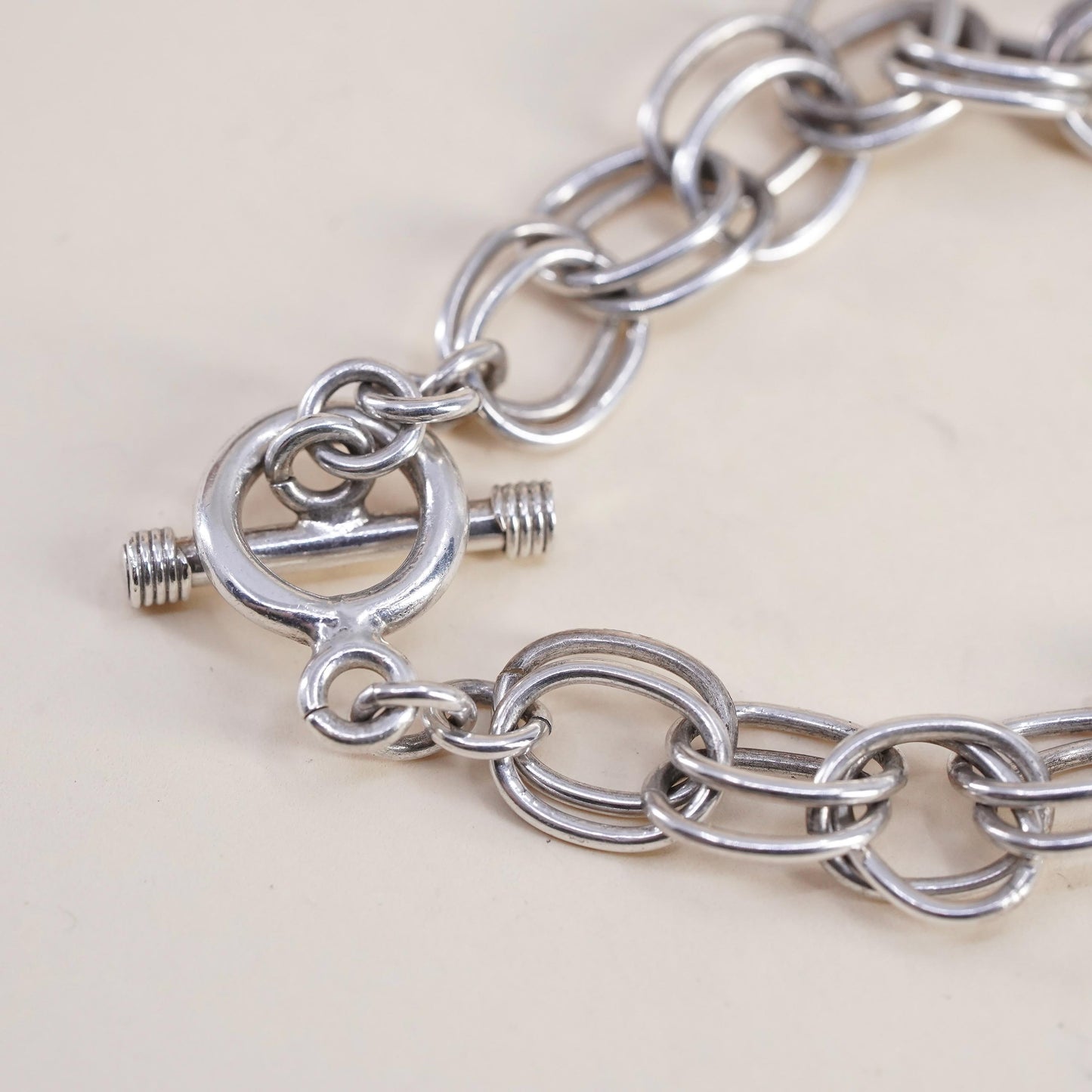 6.75", VTG sterling 925 silver textured circle charm bracelet toggle closure