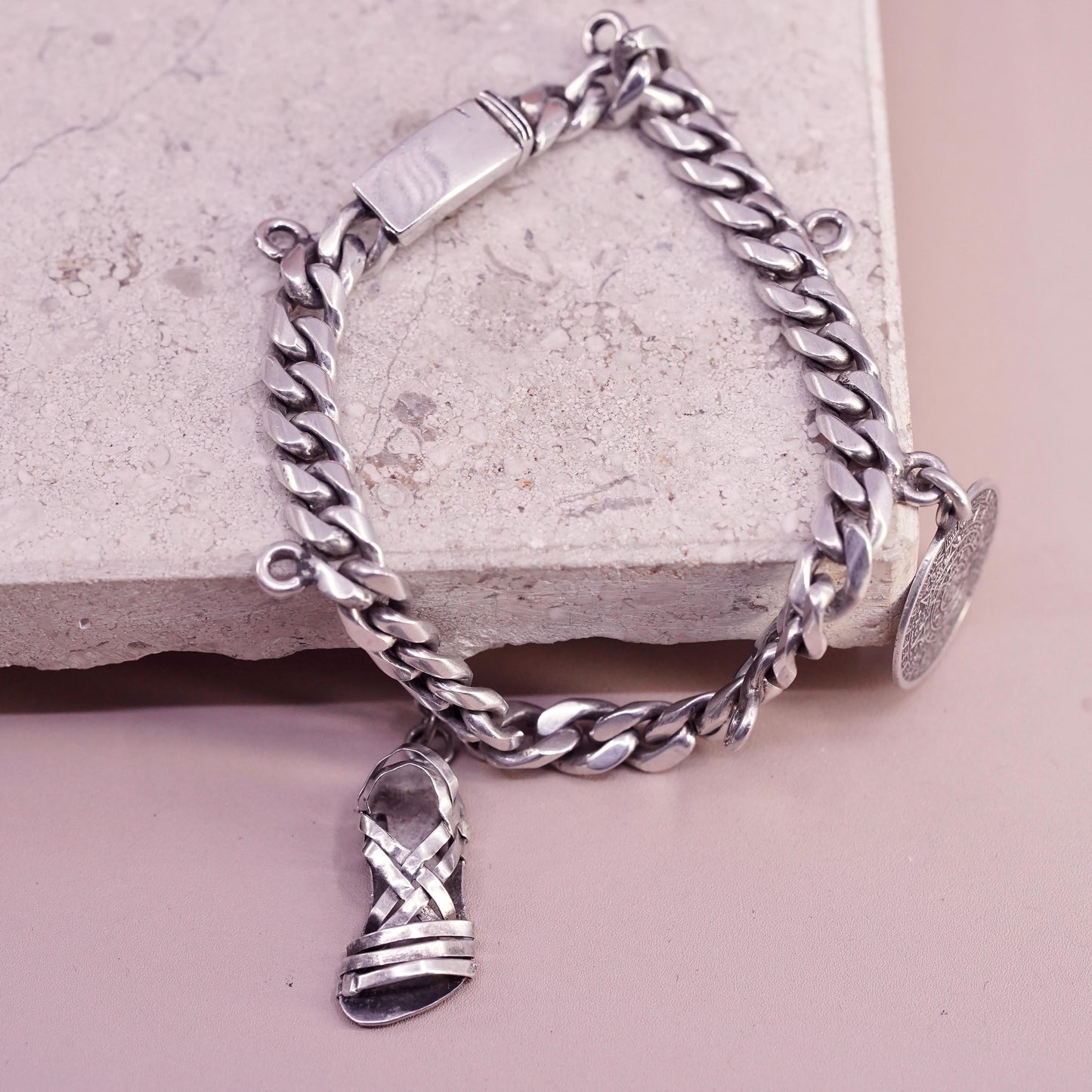 6.75” Castelan sterling silver bracelet, 925 curb chain 2 charms Mayan calendar