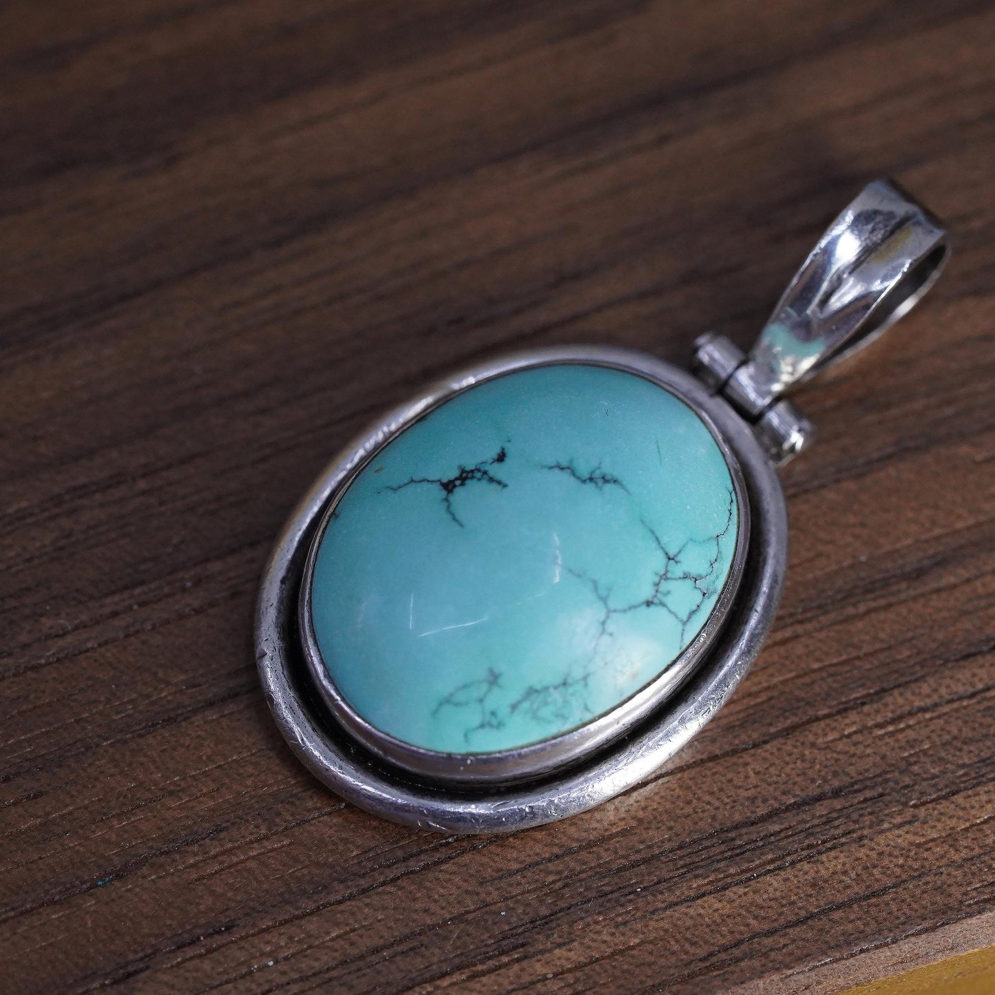 Vintage southwestern Sterling 925 silver handmade pendant with oval turquoise