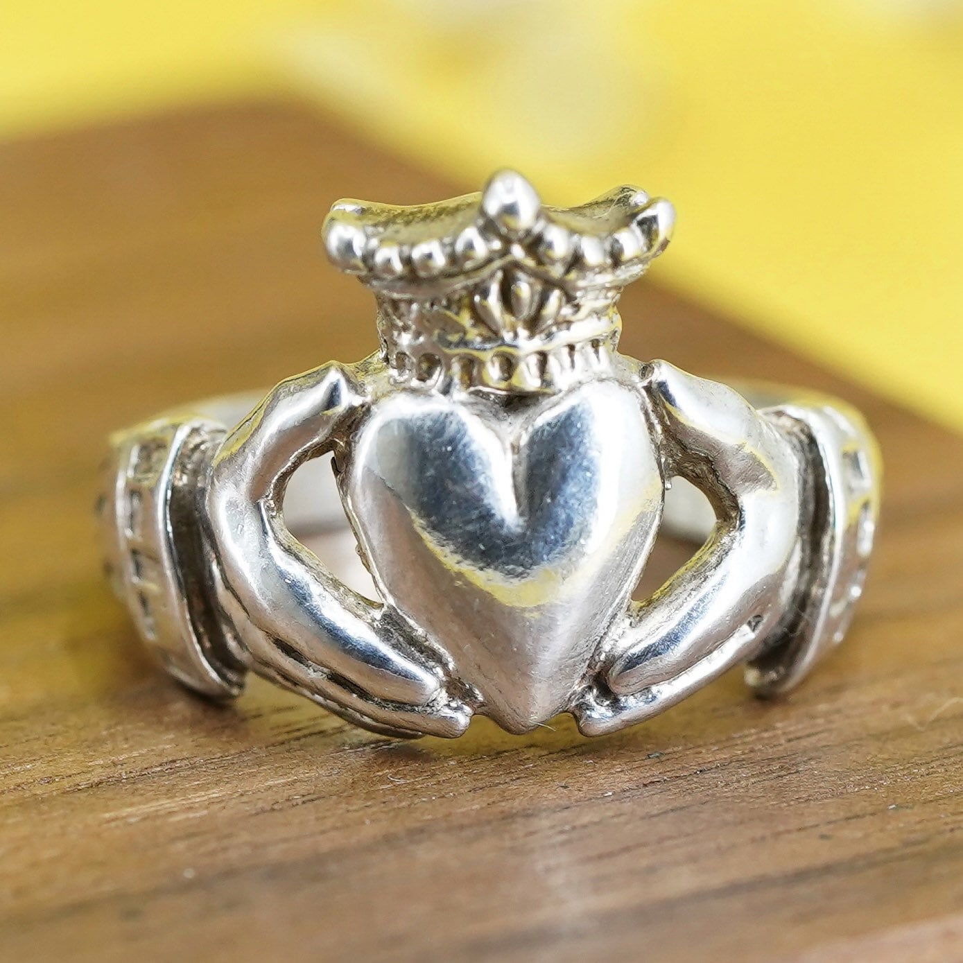 Size 7, irish sterling silver claddagh friendship ring, holding heart 925 band