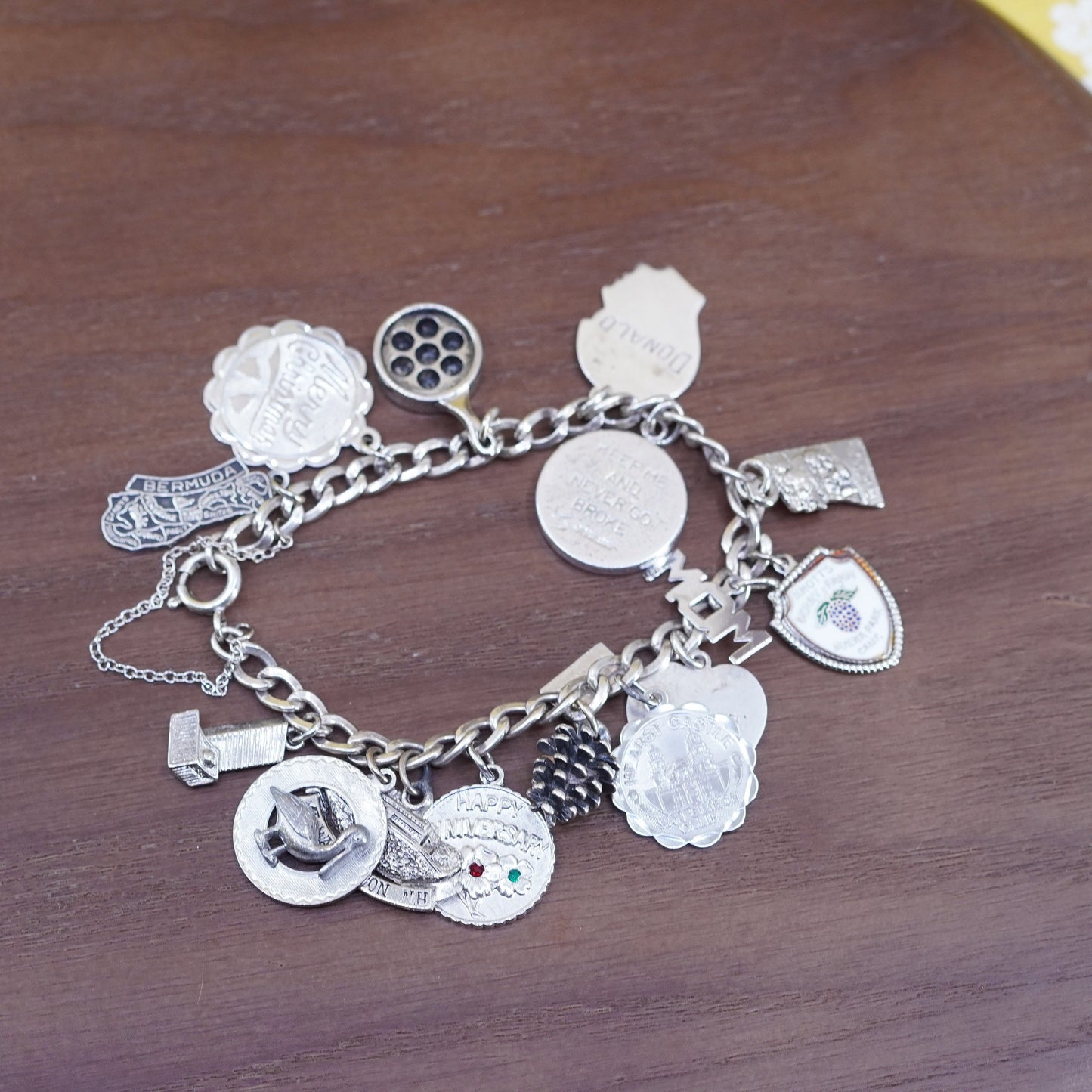 7”, vintage Sterling silver handmade bracelet, 925 curb chain with 15 charms