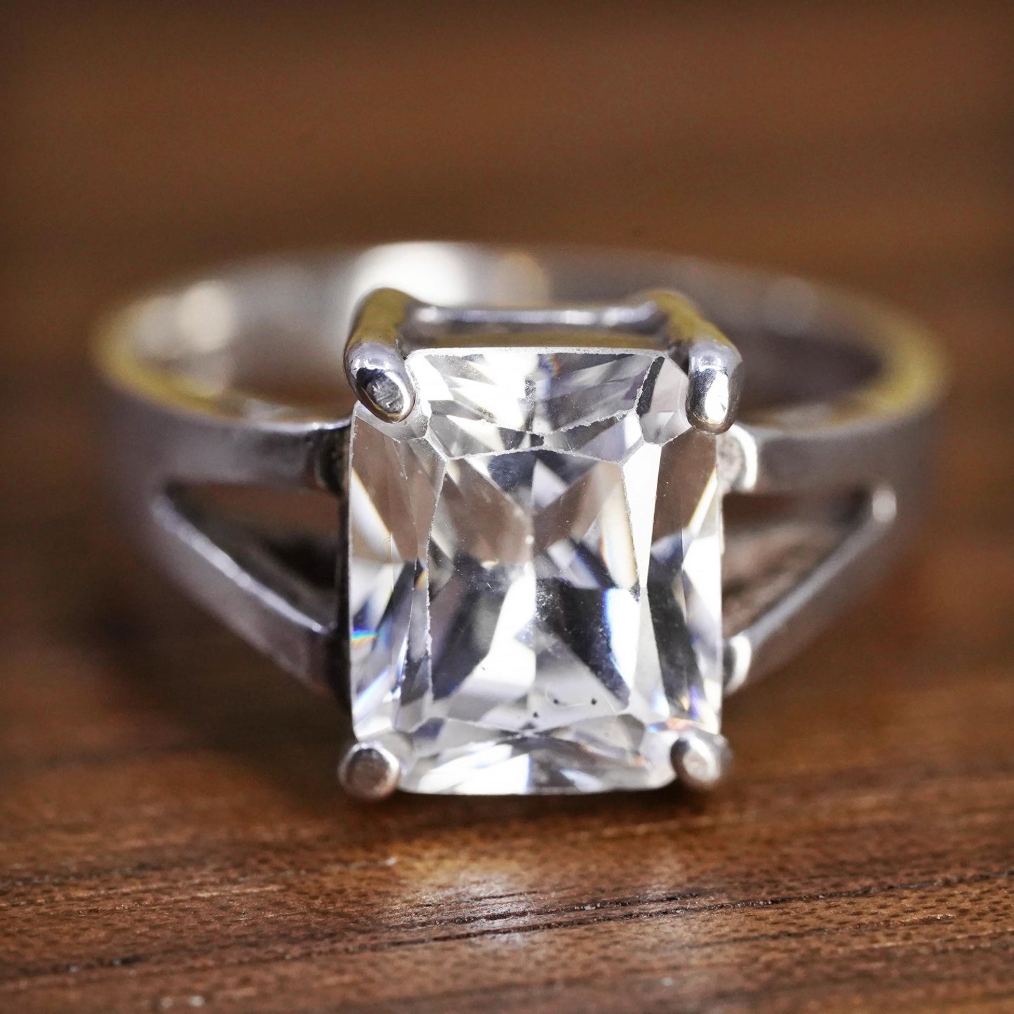 Size 7, vintage Sterling 925 silver anniversary ring with clear emerald cut cz