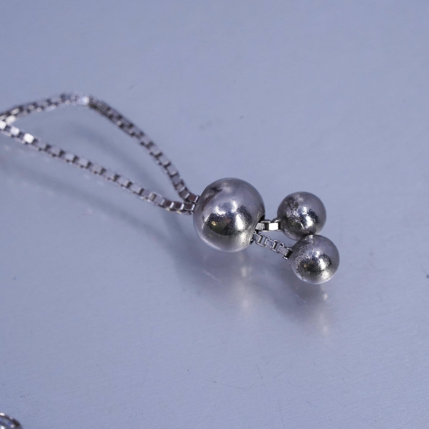 Size adjustable. Sterling 925 silver tennis bracelet, box chain cluster cz bar
