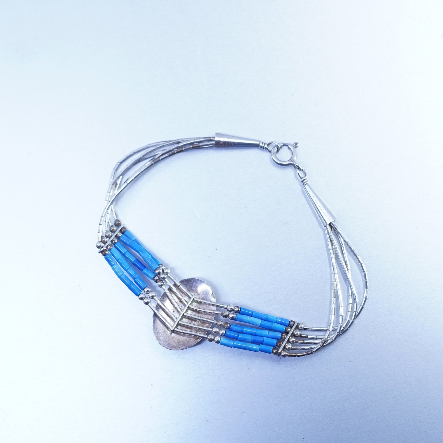 7.25”, Sterling 925 silver bracelet, liquid chain with denim lapis lazuli charm