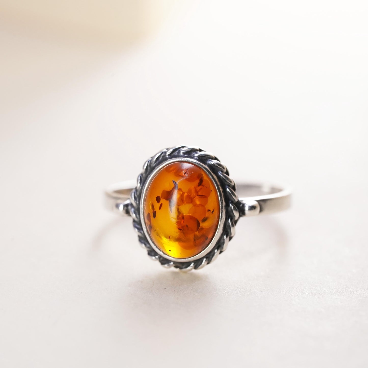 Size 5, Vintage sterling 925 silver handmade ring with Amber and cable around