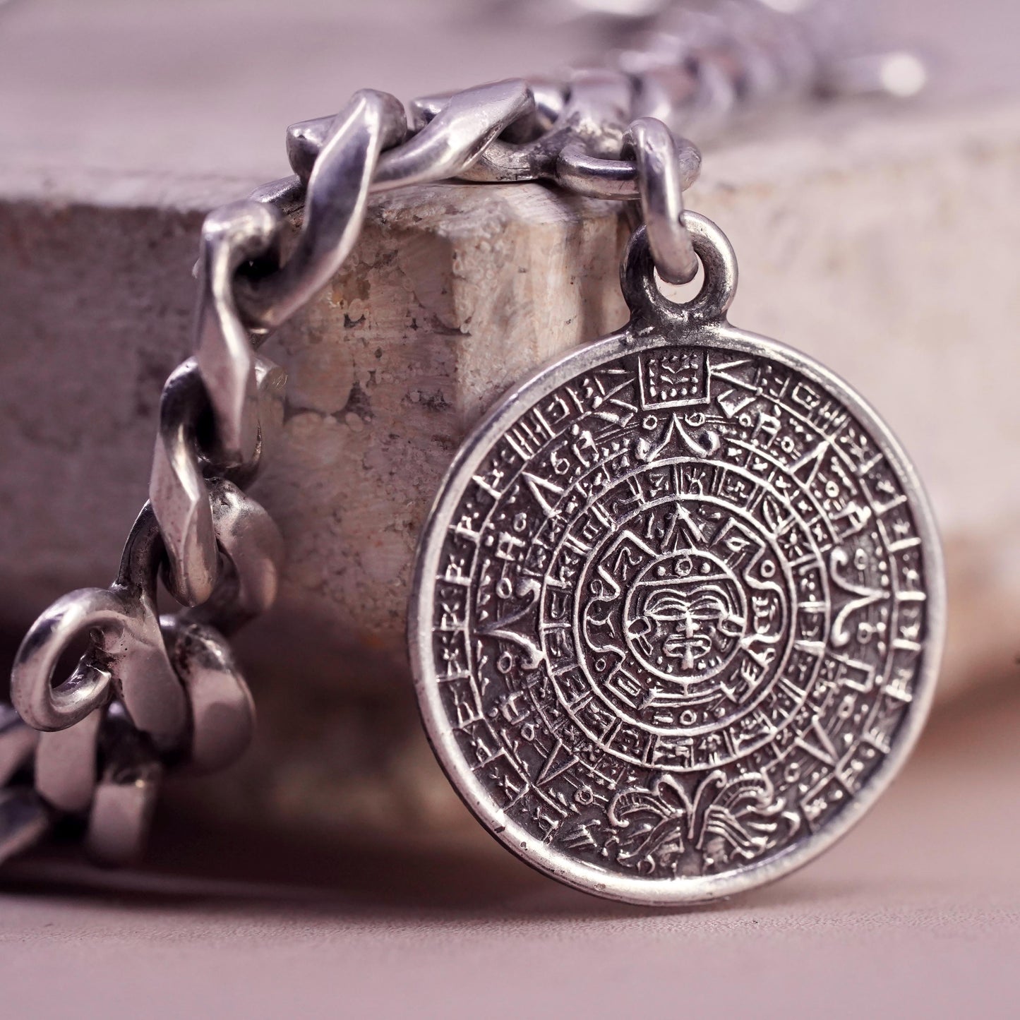 6.75” Castelan sterling silver bracelet, 925 curb chain 2 charms Mayan calendar