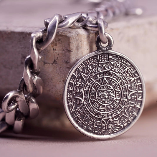6.75” Castelan sterling silver bracelet, 925 curb chain 2 charms Mayan calendar