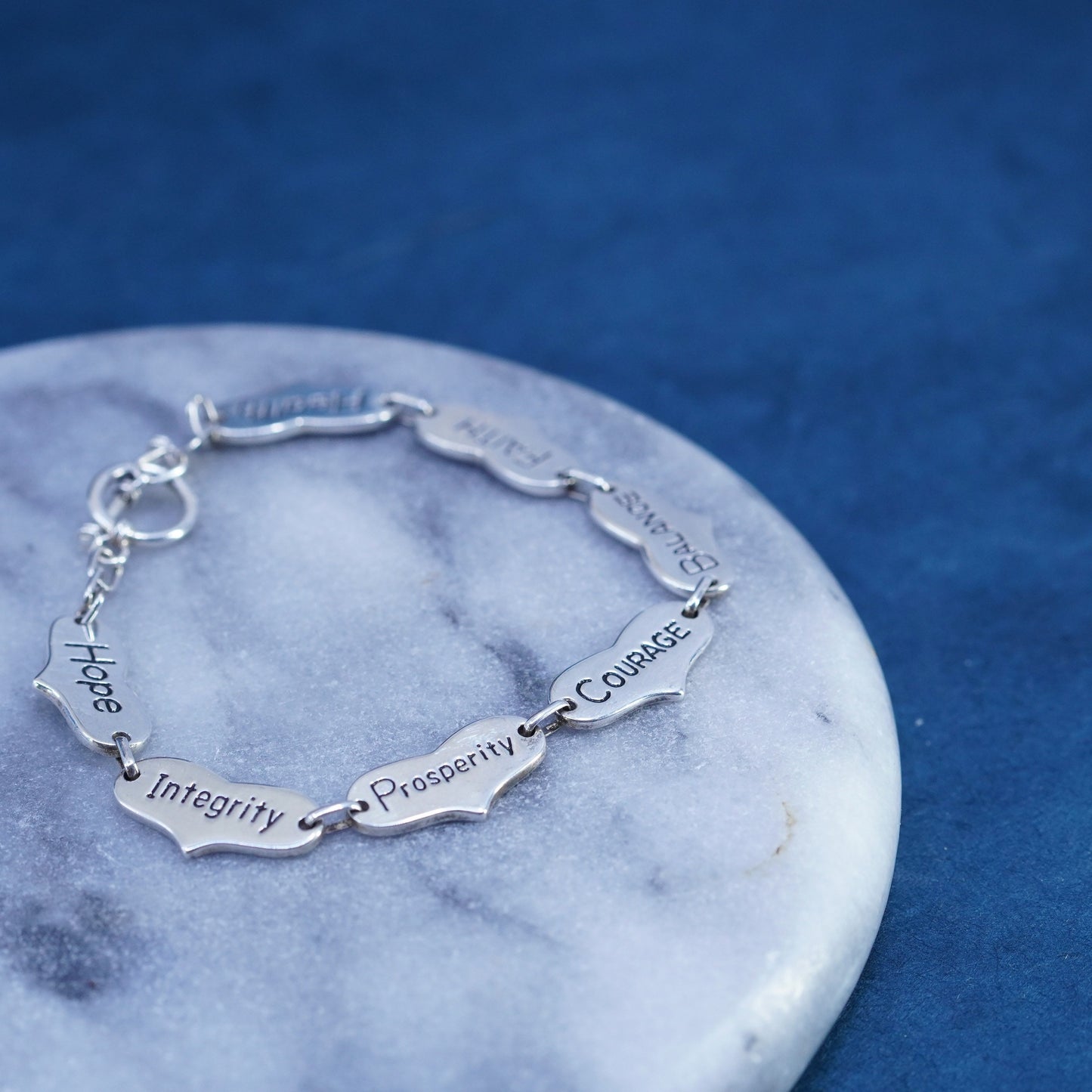 7.5”, Sterling silver bracelet, 925 heart chain embossed “love trust strength
