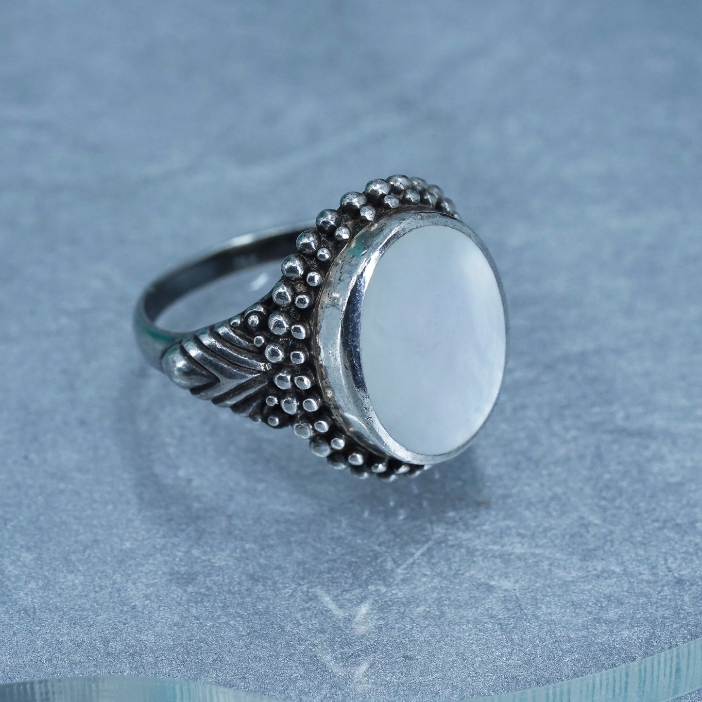 Size 7.5, southwestern Sterling 925 silver ring with mother of pearl and beads