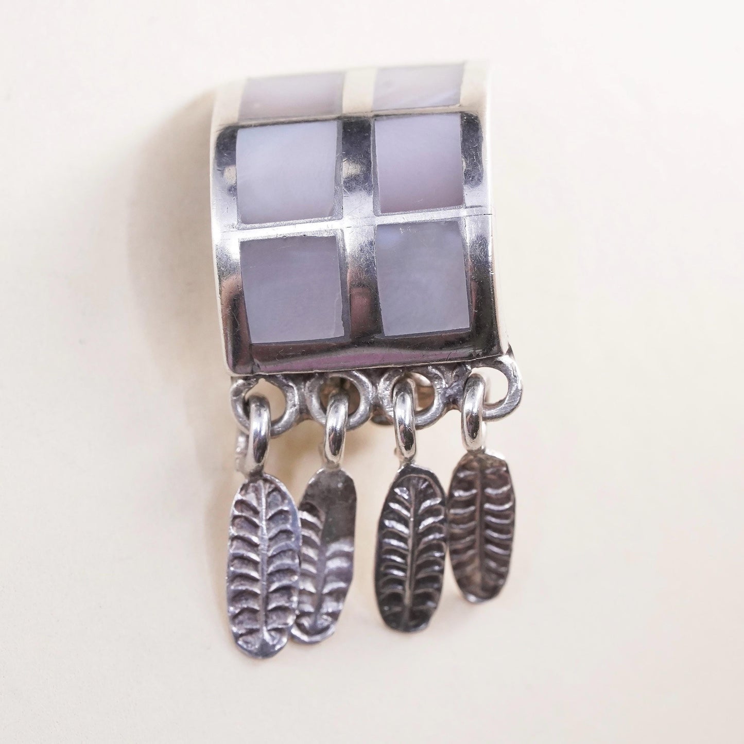 Mexican sterling silver single earring, 925 clip on w/ mother of pearl feather