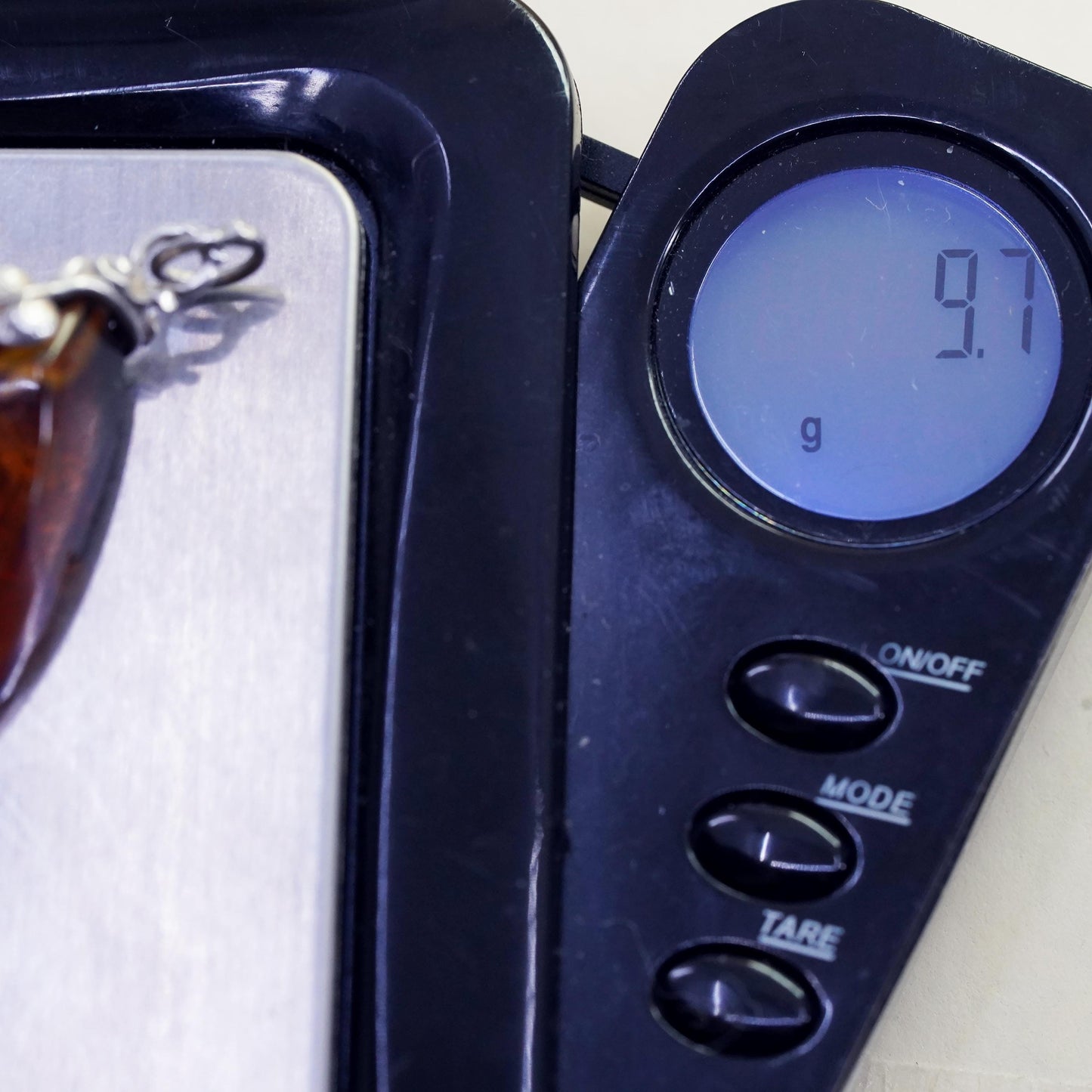 Vintage sterling 925 silver handmade pendant with amber nugget and leaf bail