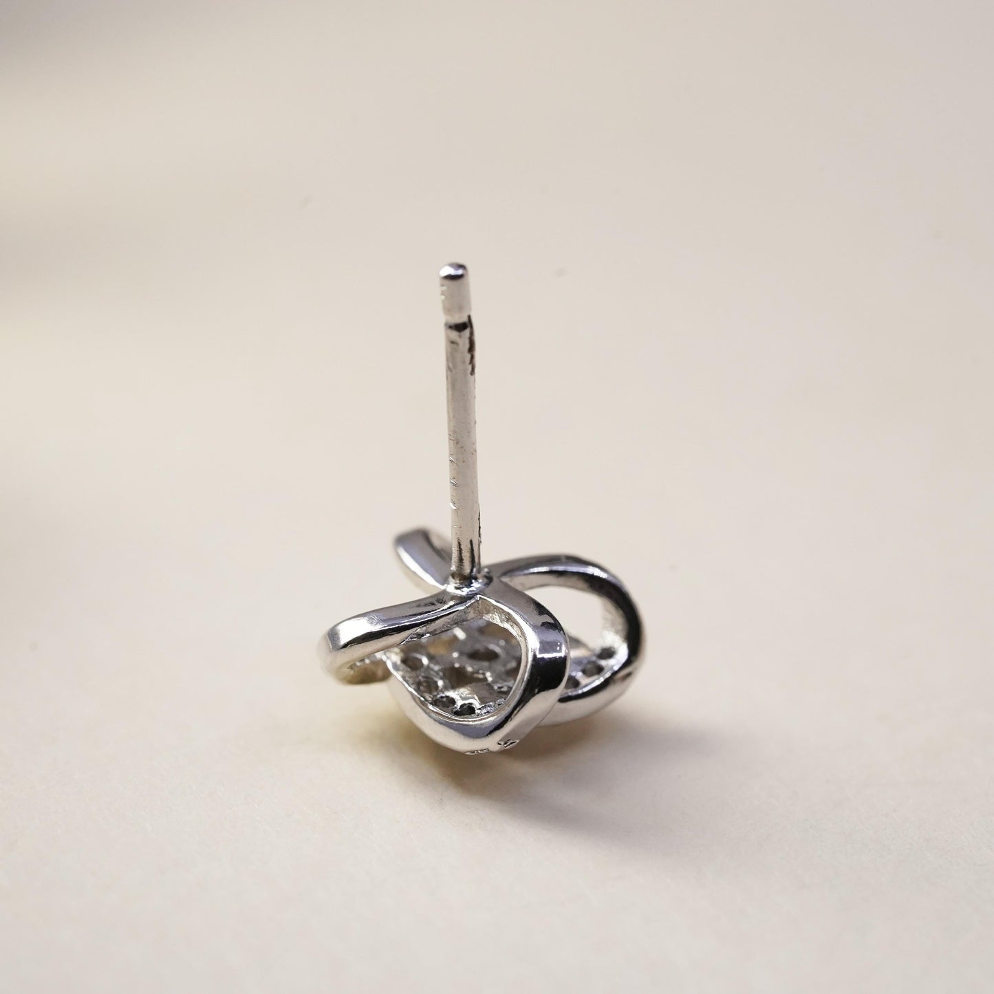 Vintage handmade single earring. Sterling 925 silver cz entwinted stud